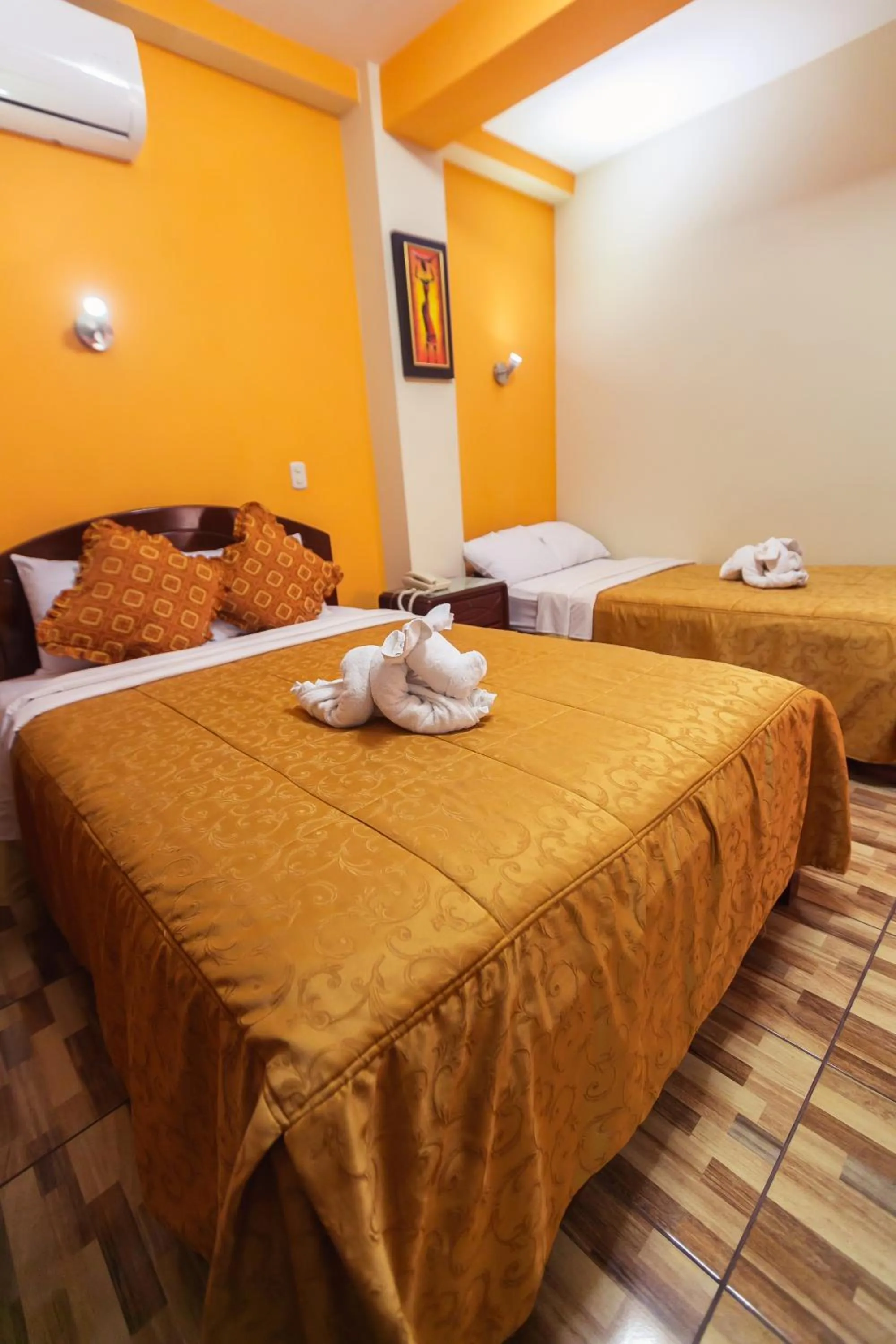 Bed in Hotel Suite Plaza