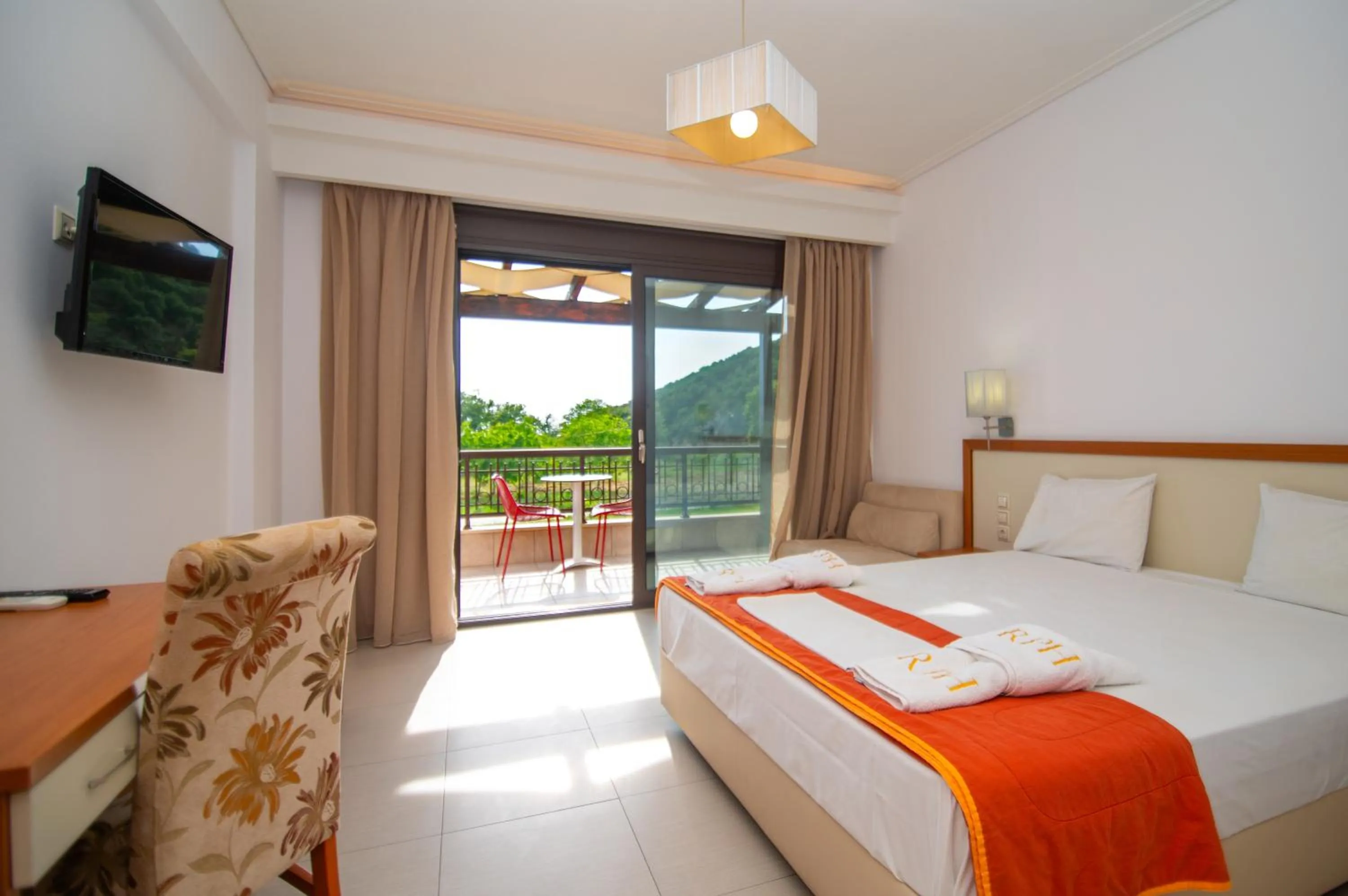 Bed in Riviera Perdika Hotel