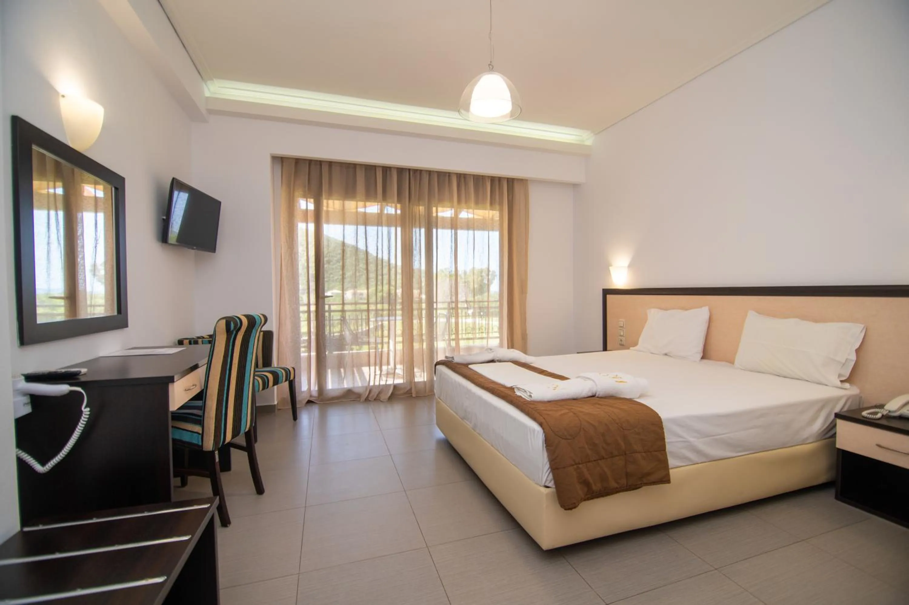 Bed in Riviera Perdika Hotel