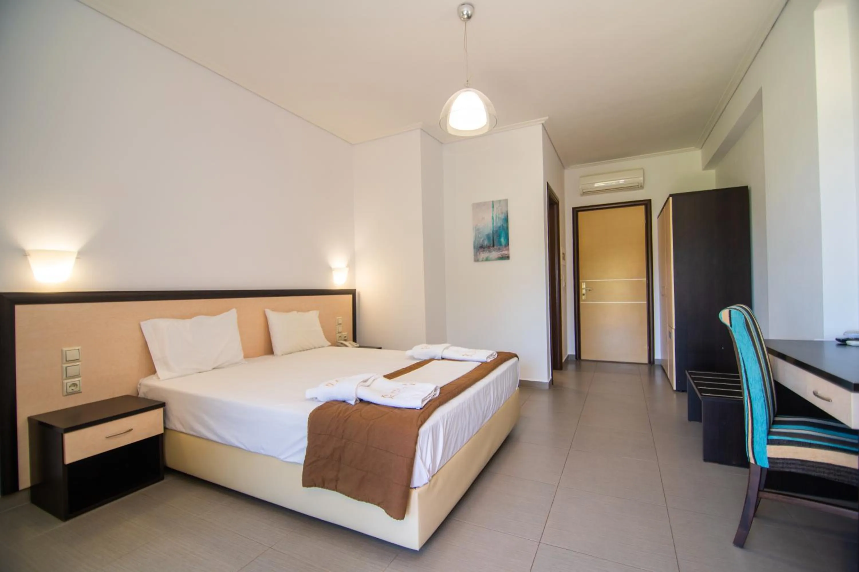 Bed in Riviera Perdika Hotel