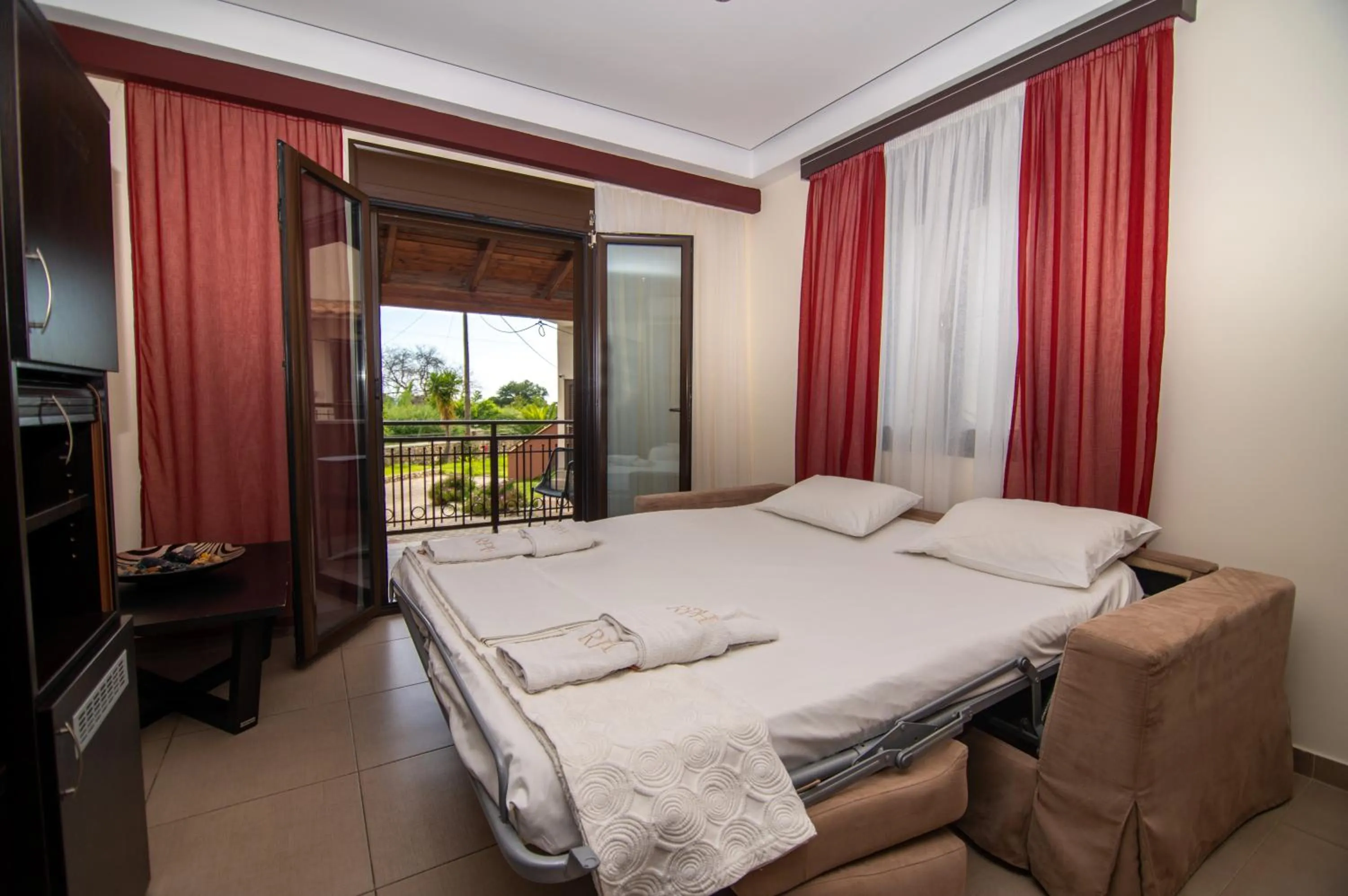 Living room, Bed in Riviera Perdika Hotel