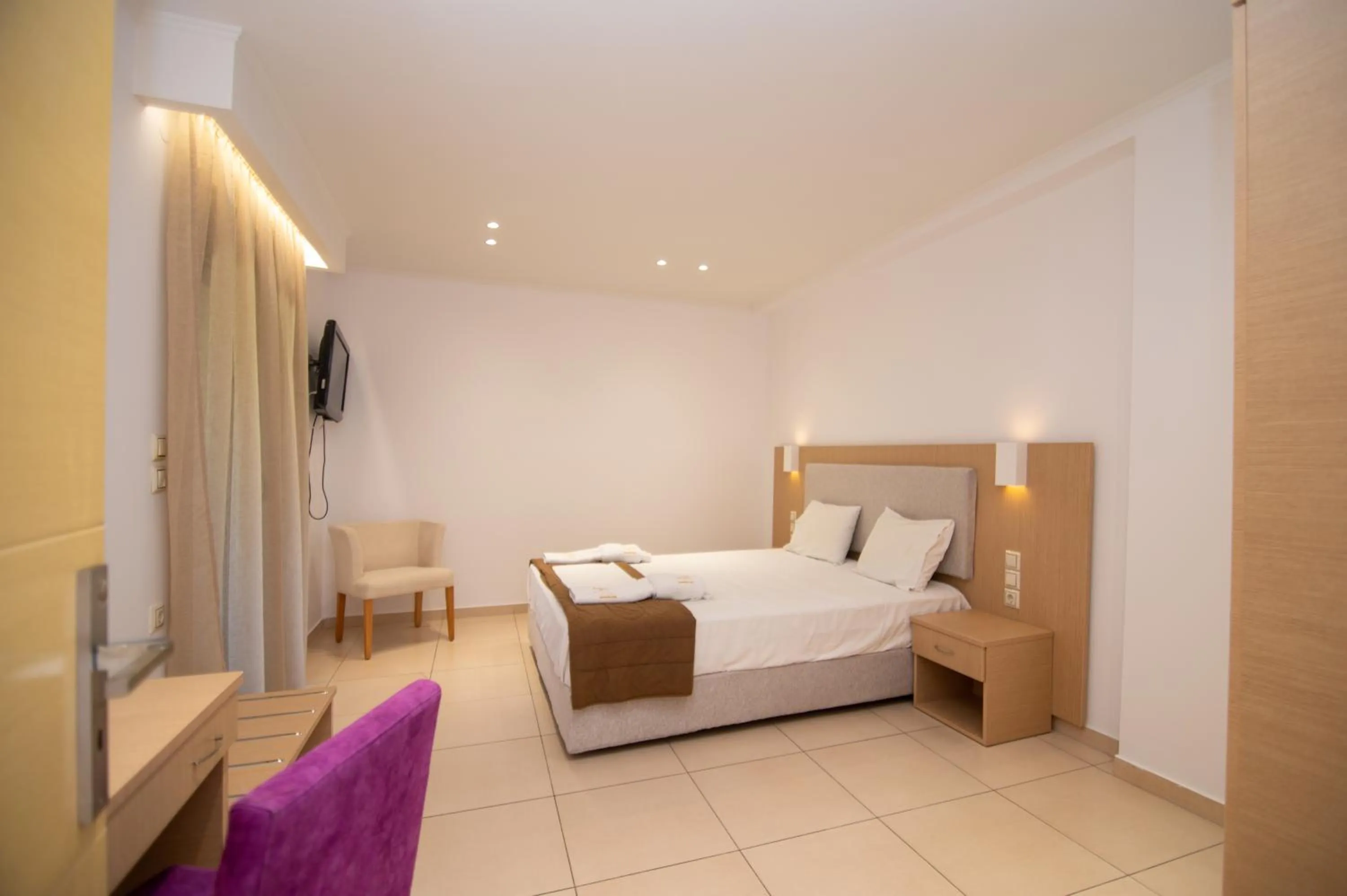 Bed in Riviera Perdika Hotel