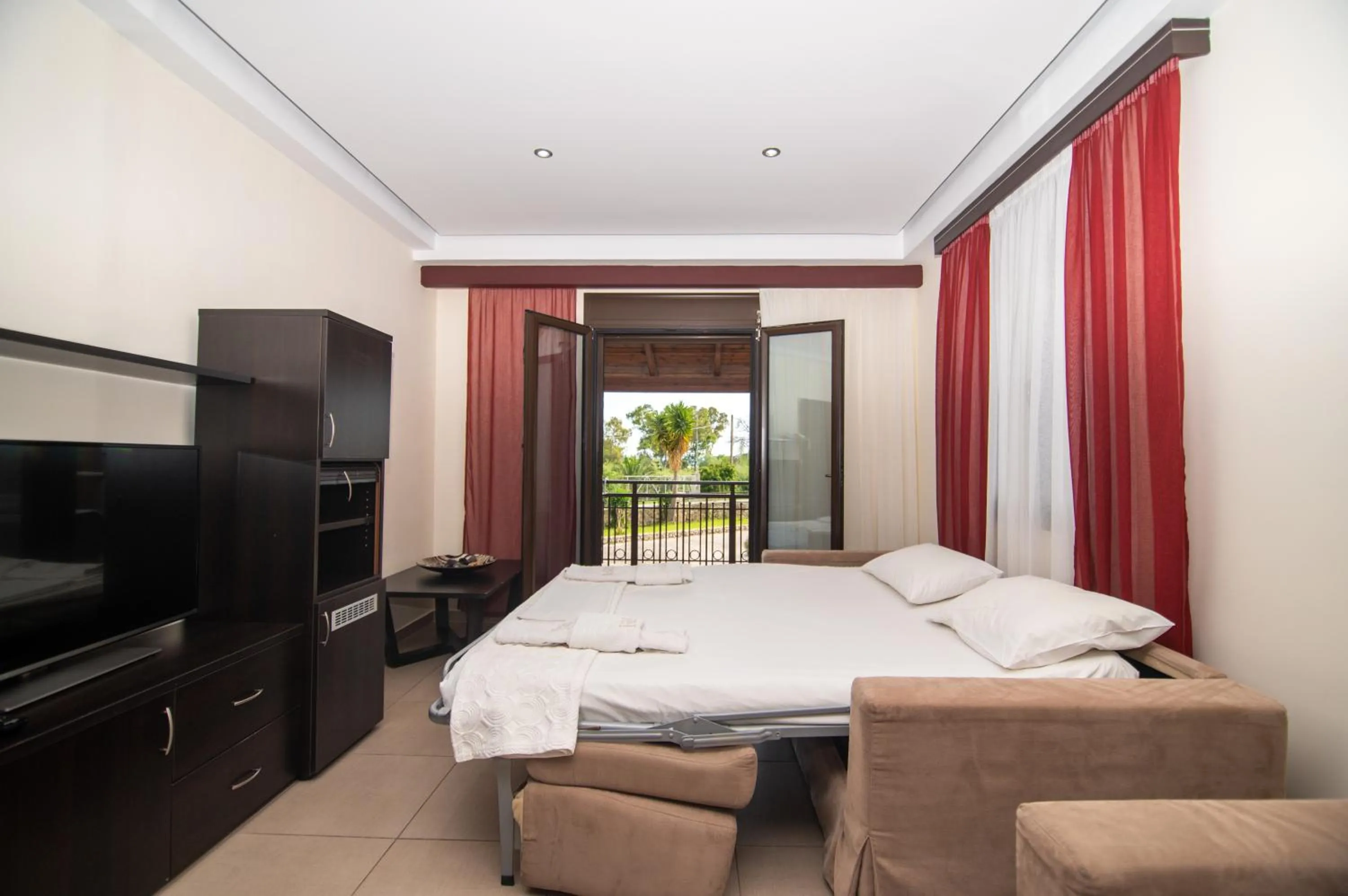 Living room, Bed in Riviera Perdika Hotel