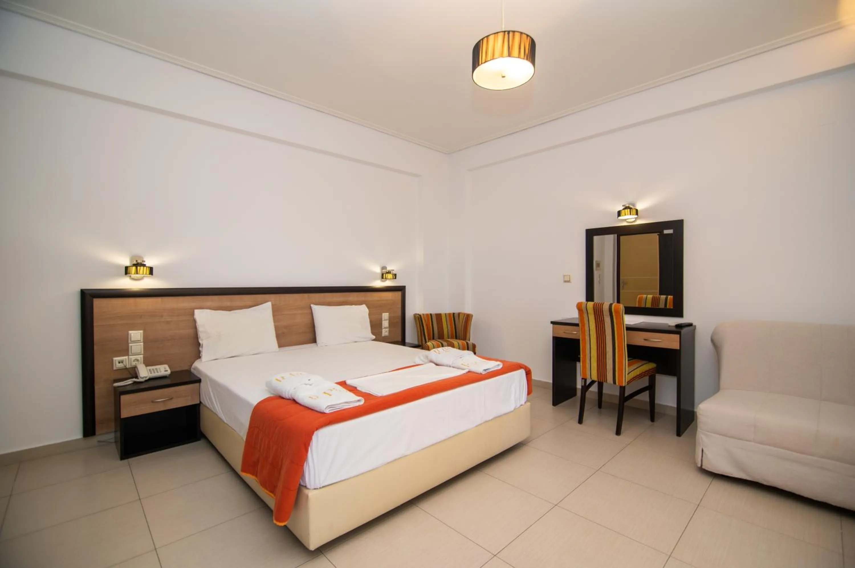 Bed in Riviera Perdika Hotel