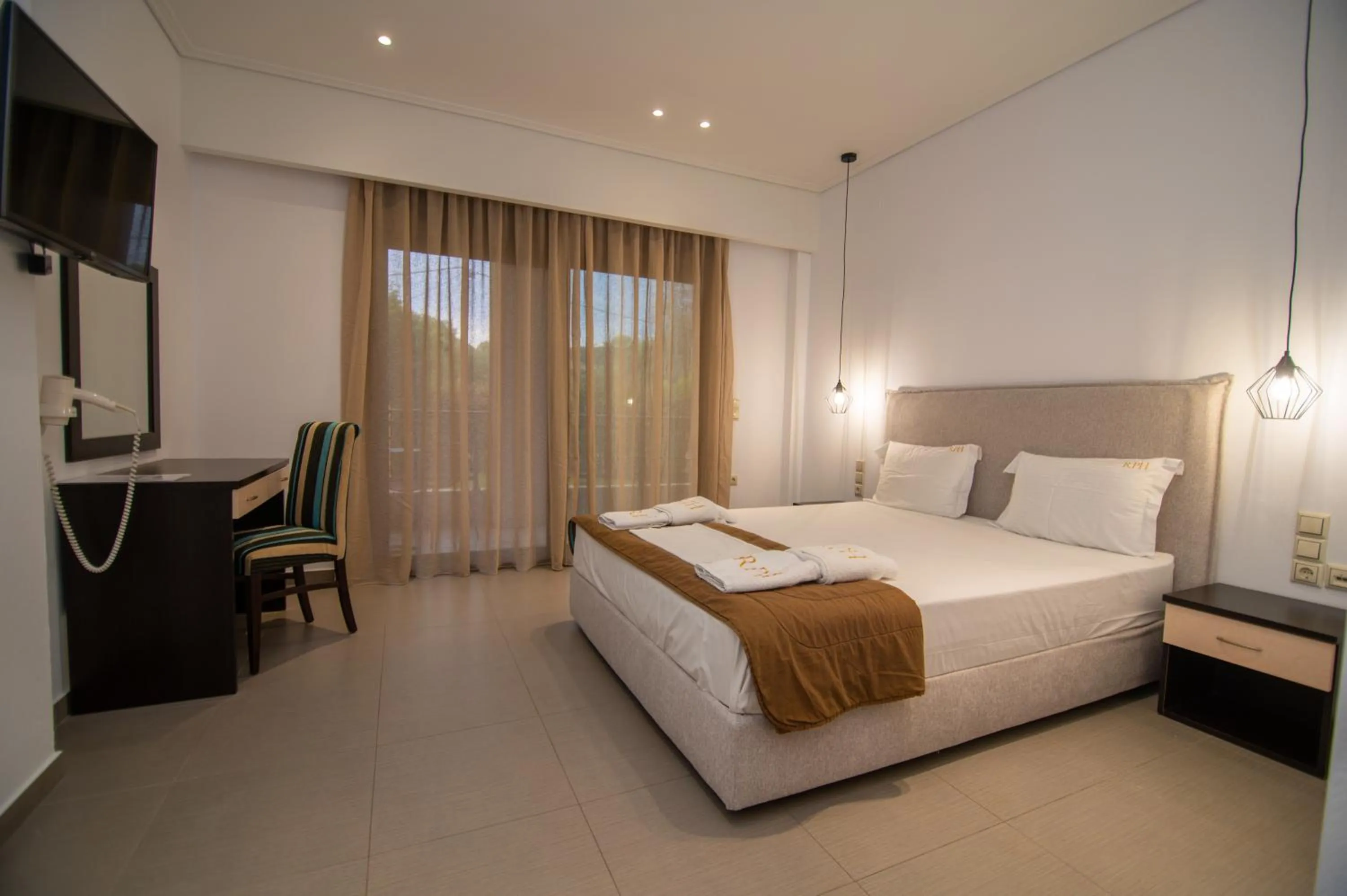 Bed in Riviera Perdika Hotel