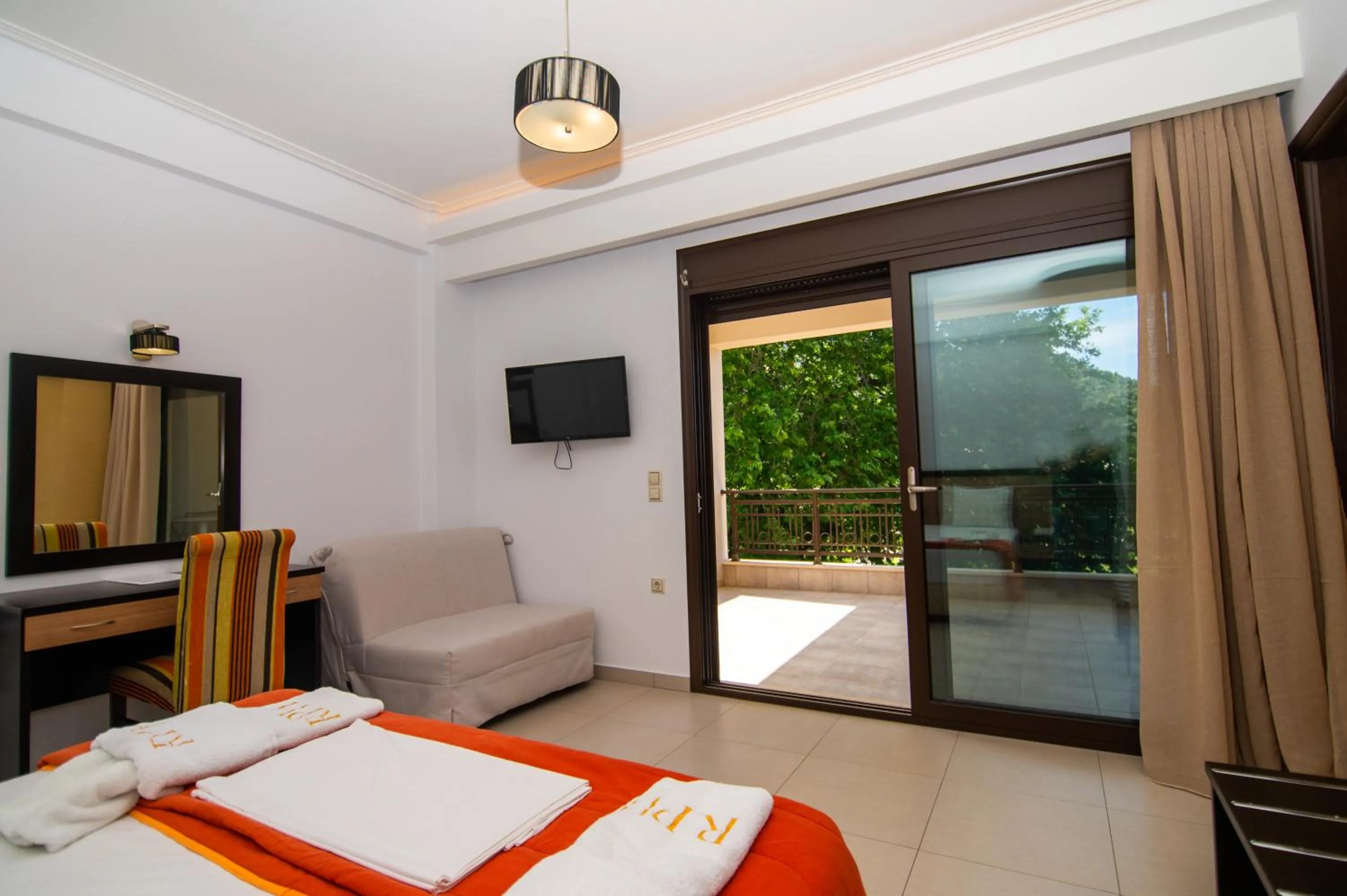 Bed in Riviera Perdika Hotel