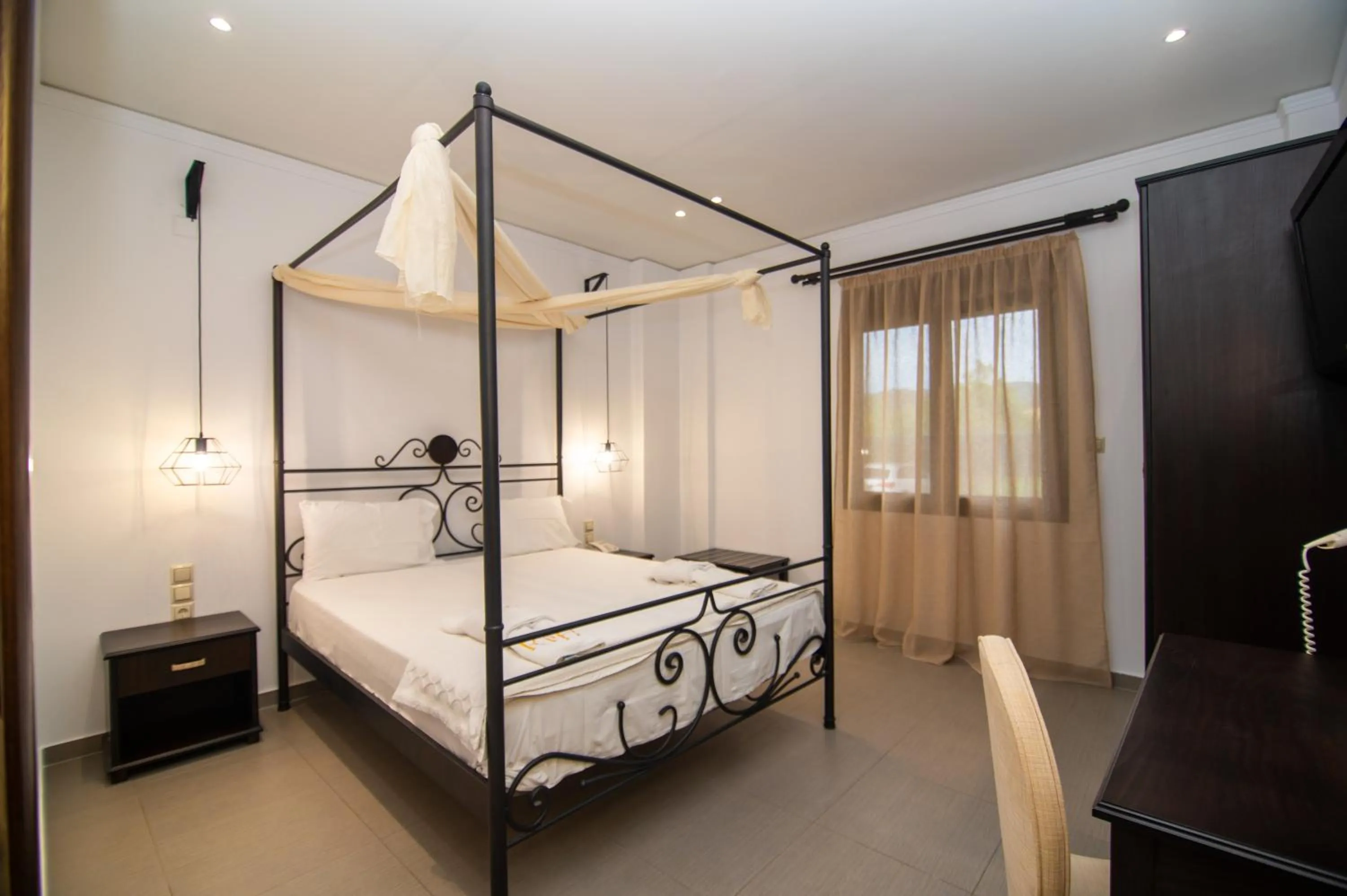 Bed in Riviera Perdika Hotel