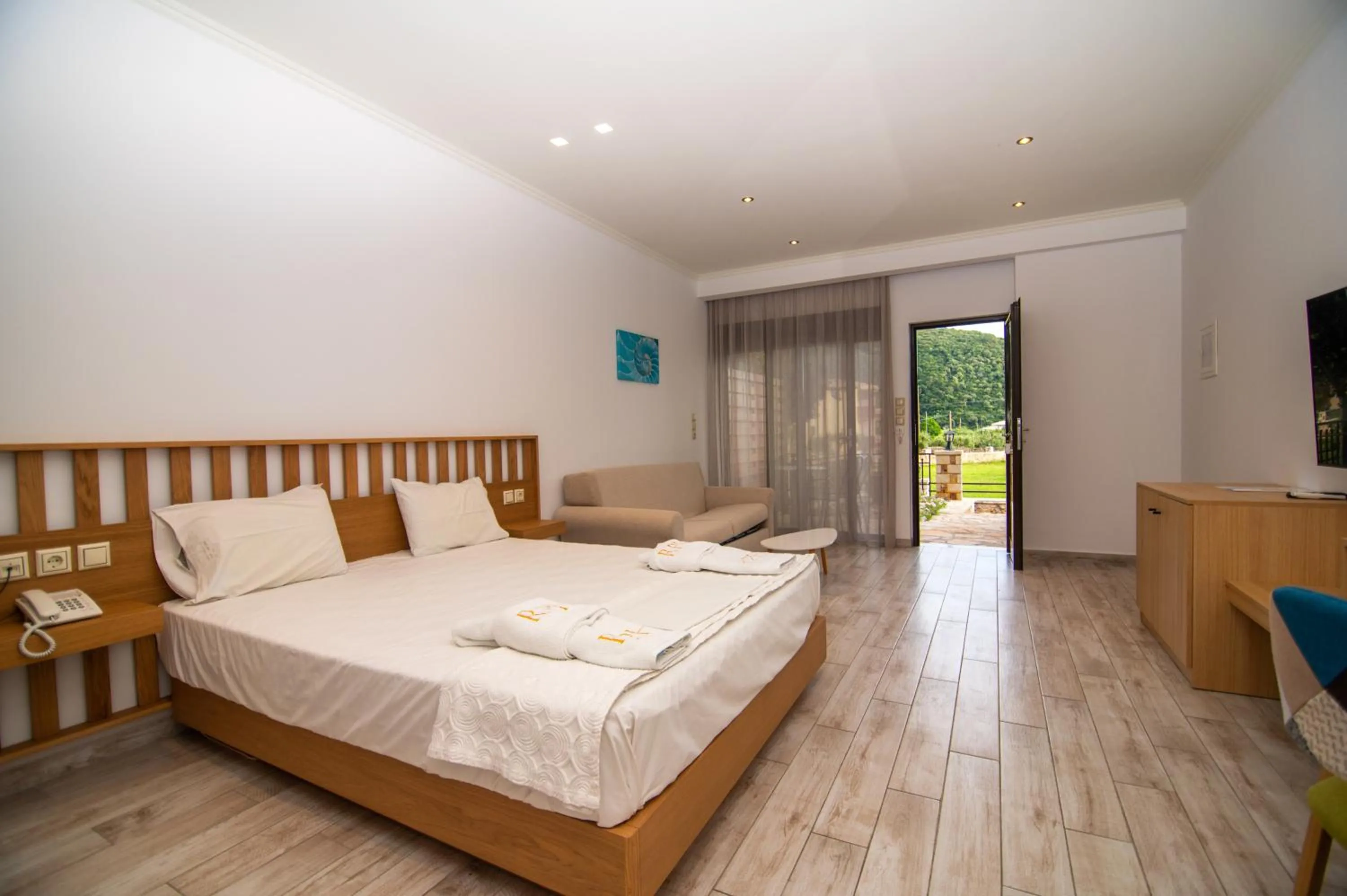 Bed in Riviera Perdika Hotel