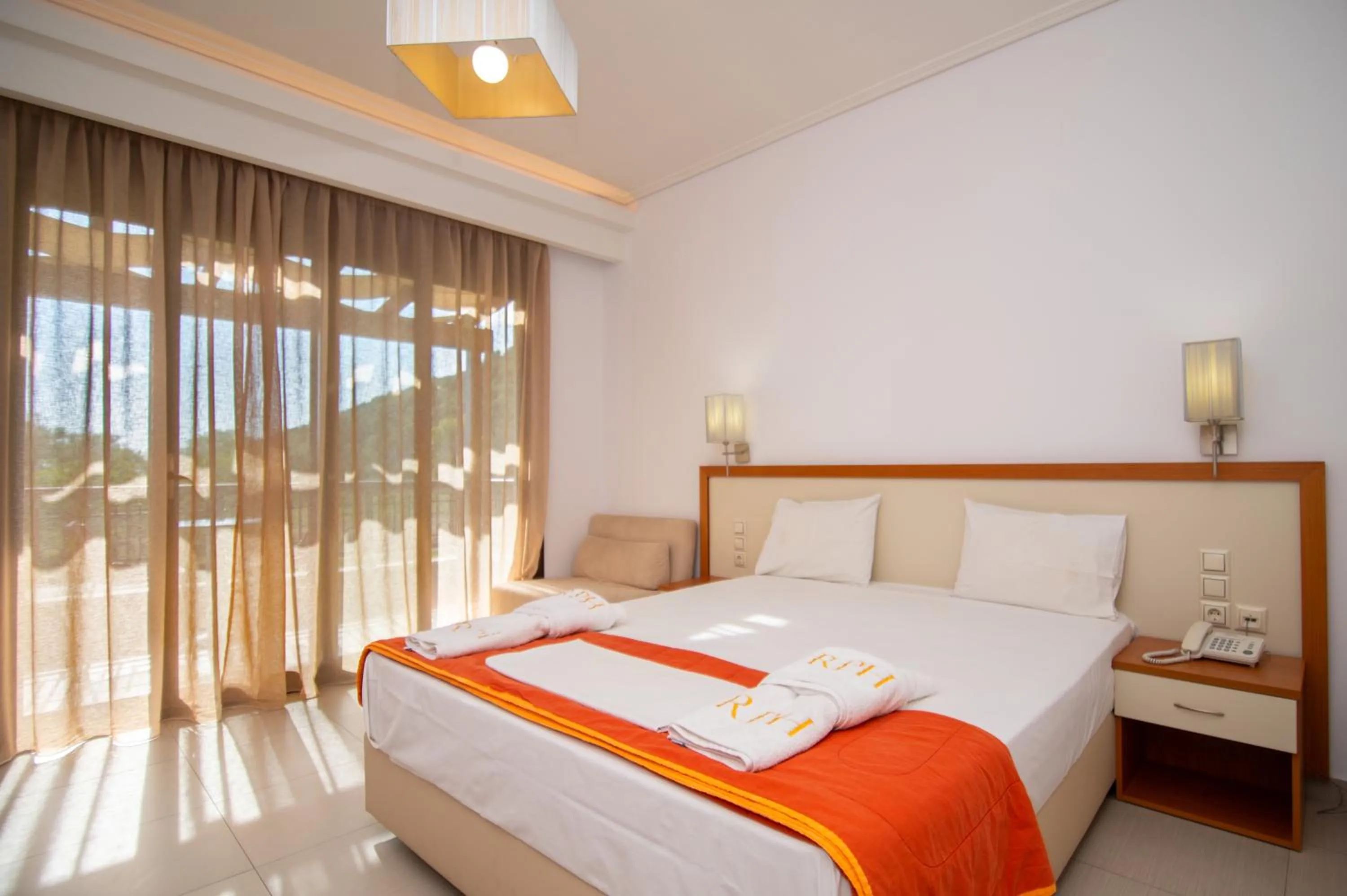 Bed in Riviera Perdika Hotel