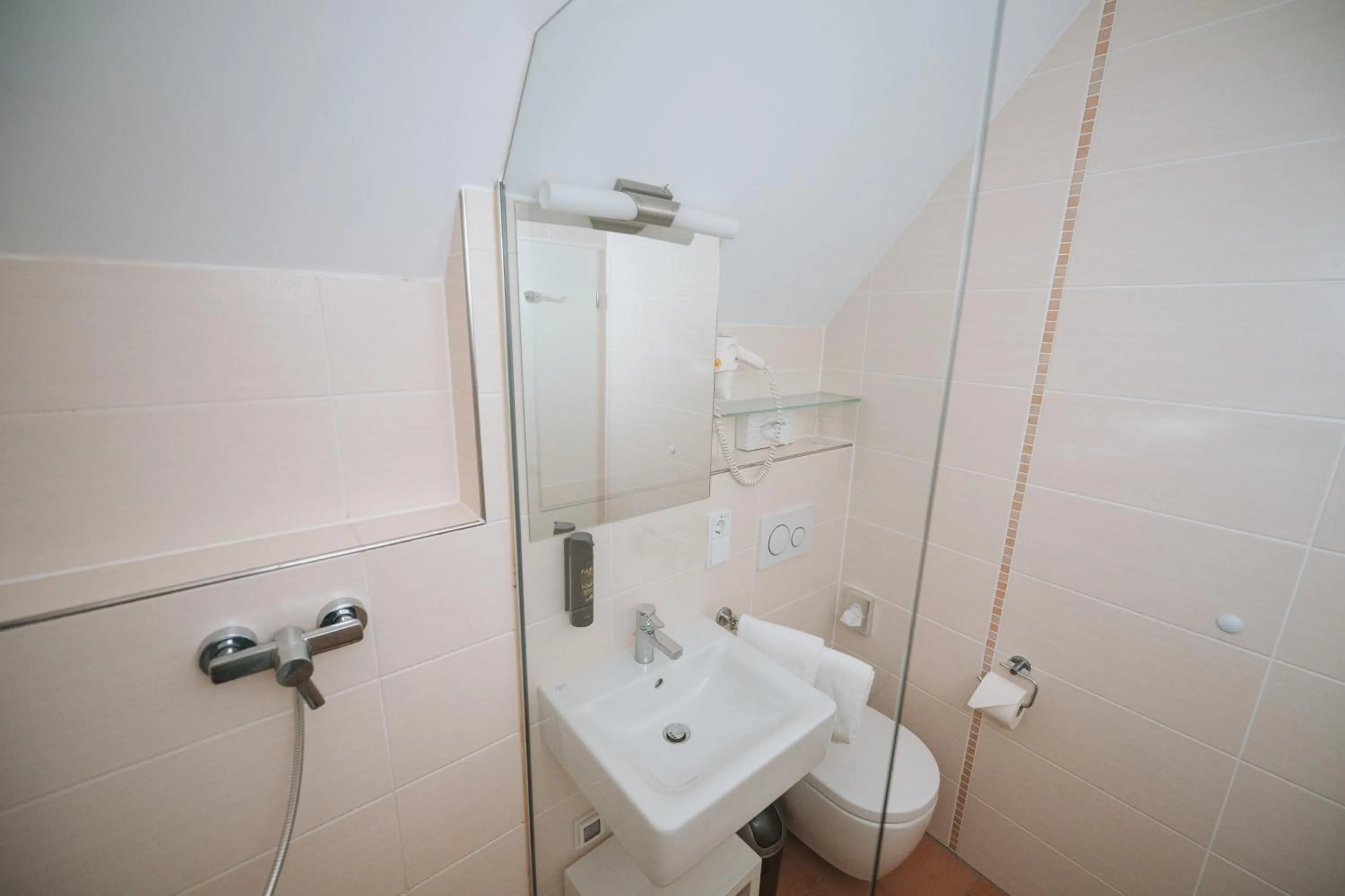 Bathroom in das seidl - Hotel & Tagung - München West