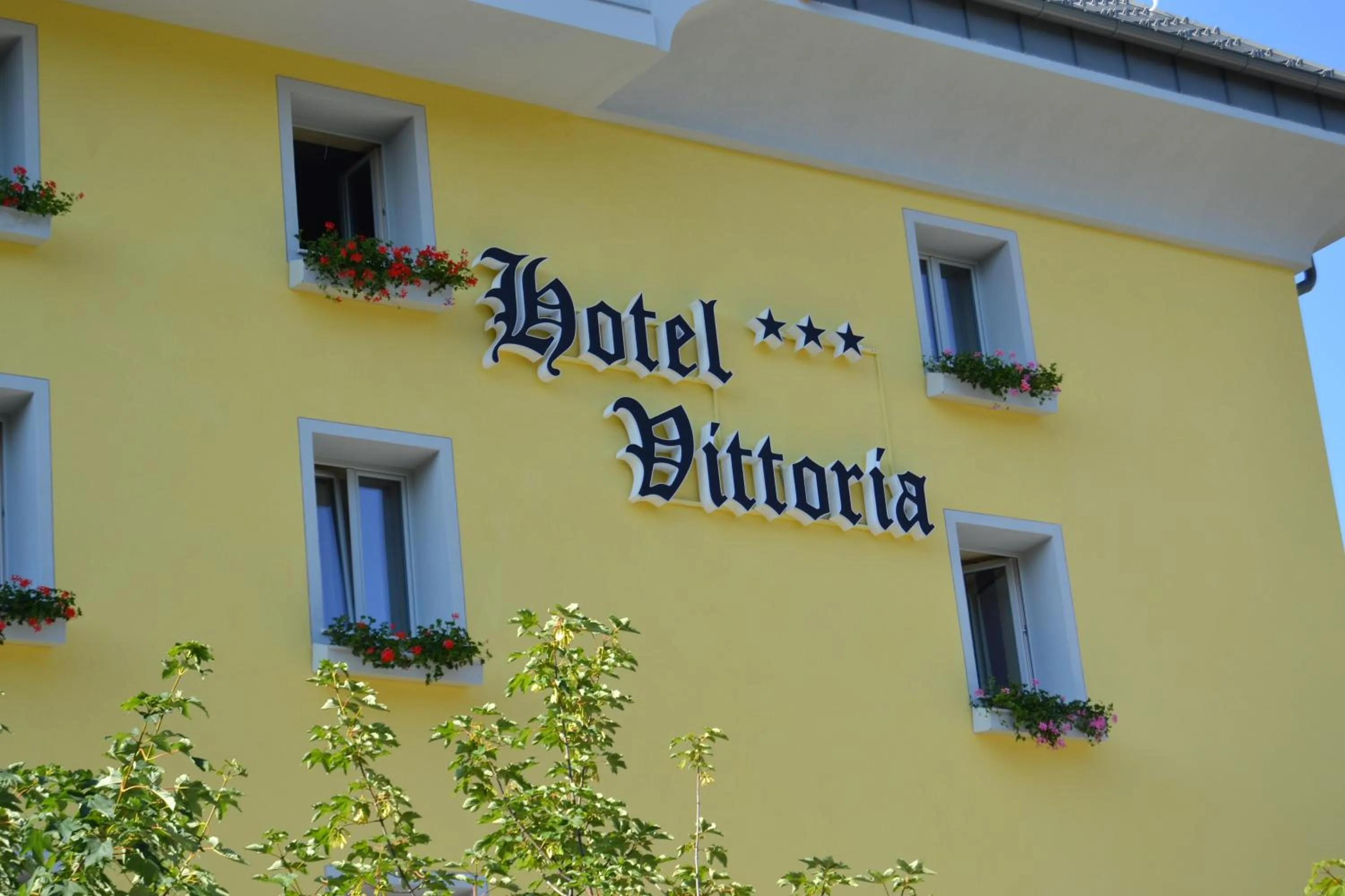Property logo or sign in Hotel Vittoria