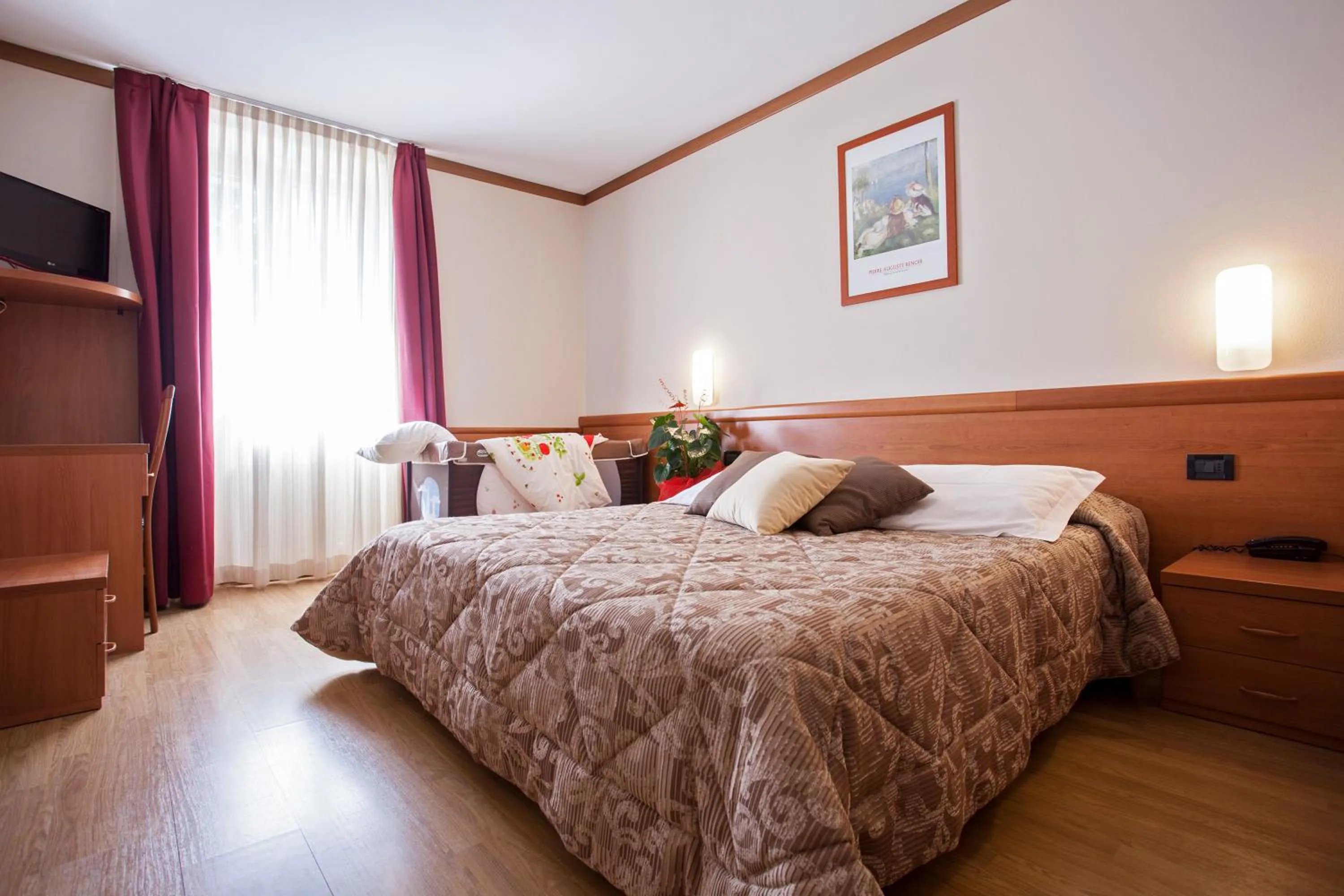 Bed in Hotel Vittoria