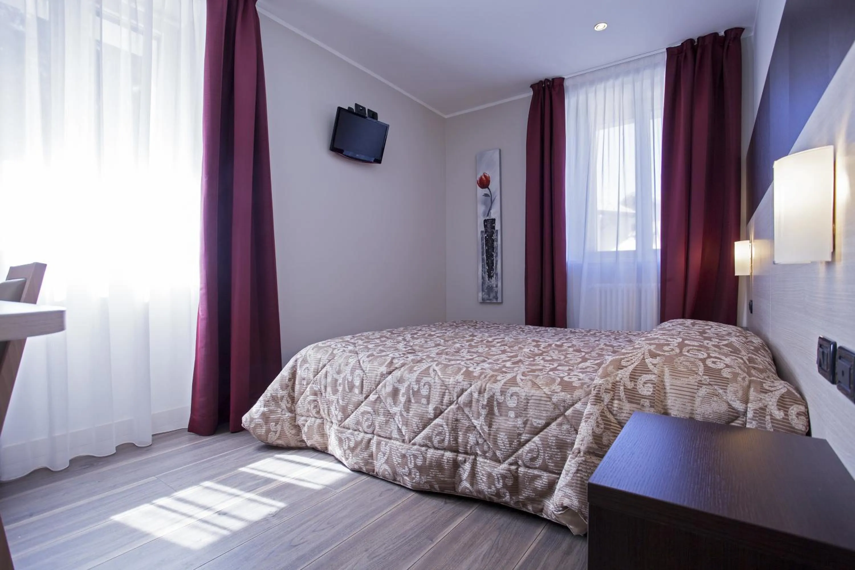 Bed in Hotel Vittoria