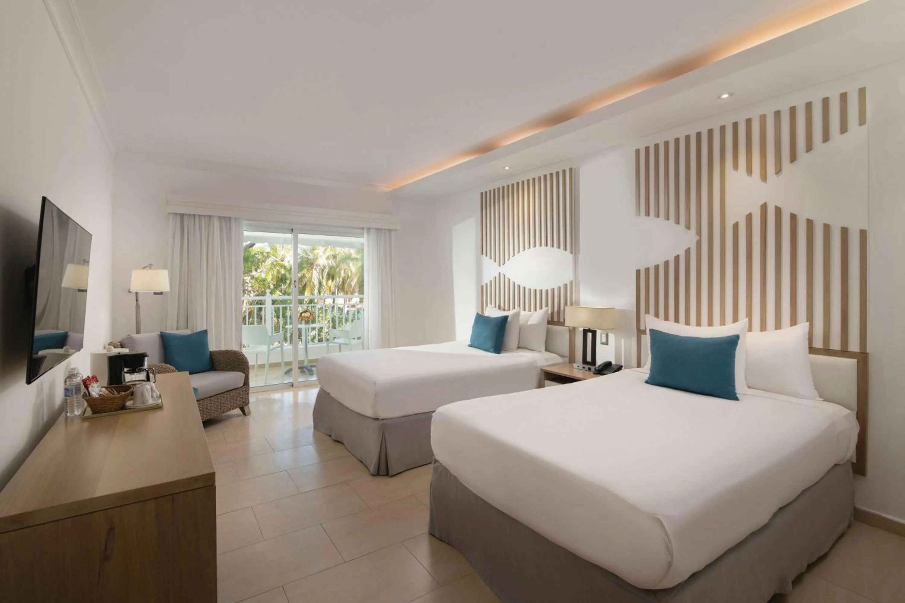 Photo of the whole room, Bed in Wyndham Alltra Samana All Inclusive Resort