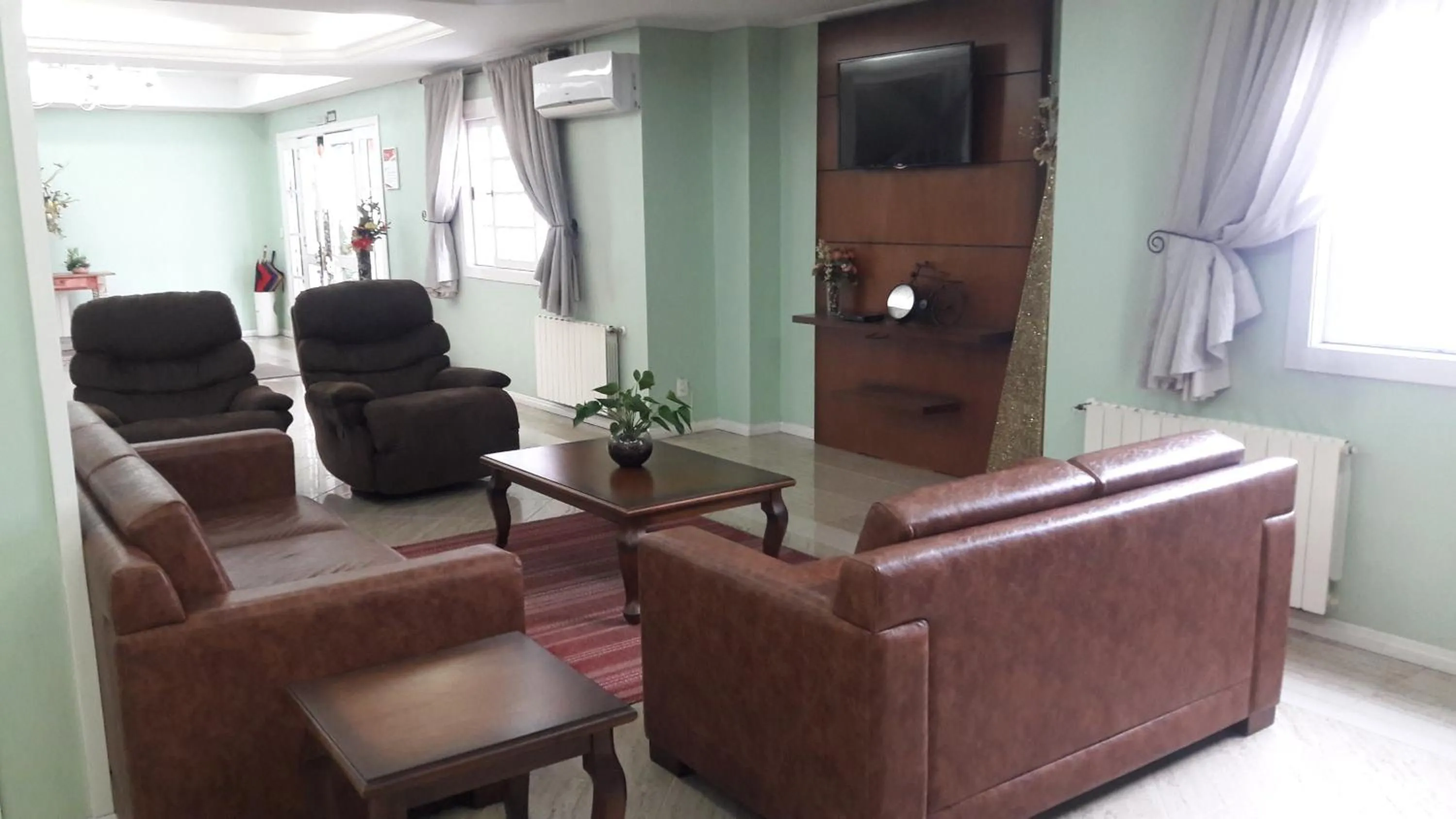 Living room in Hotel Galo Vermelho