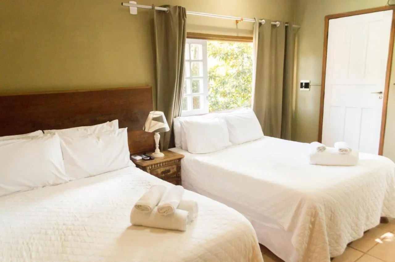 Bed in Pousada Papyrus