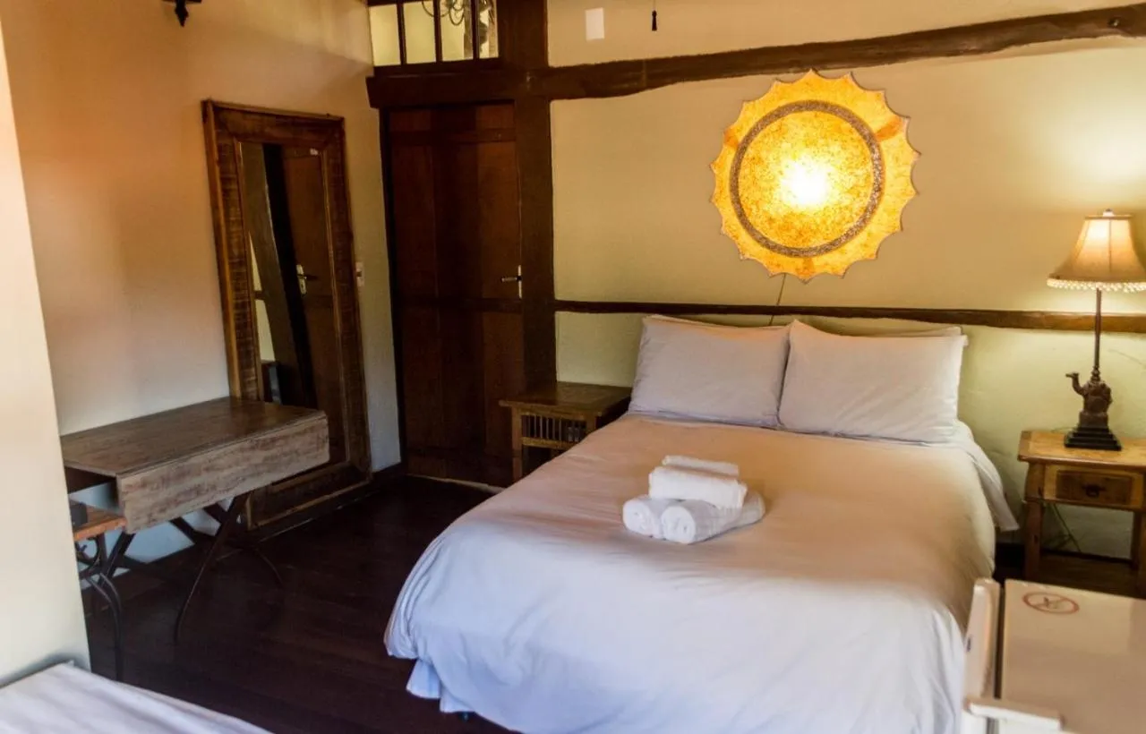 Bed in Pousada Papyrus