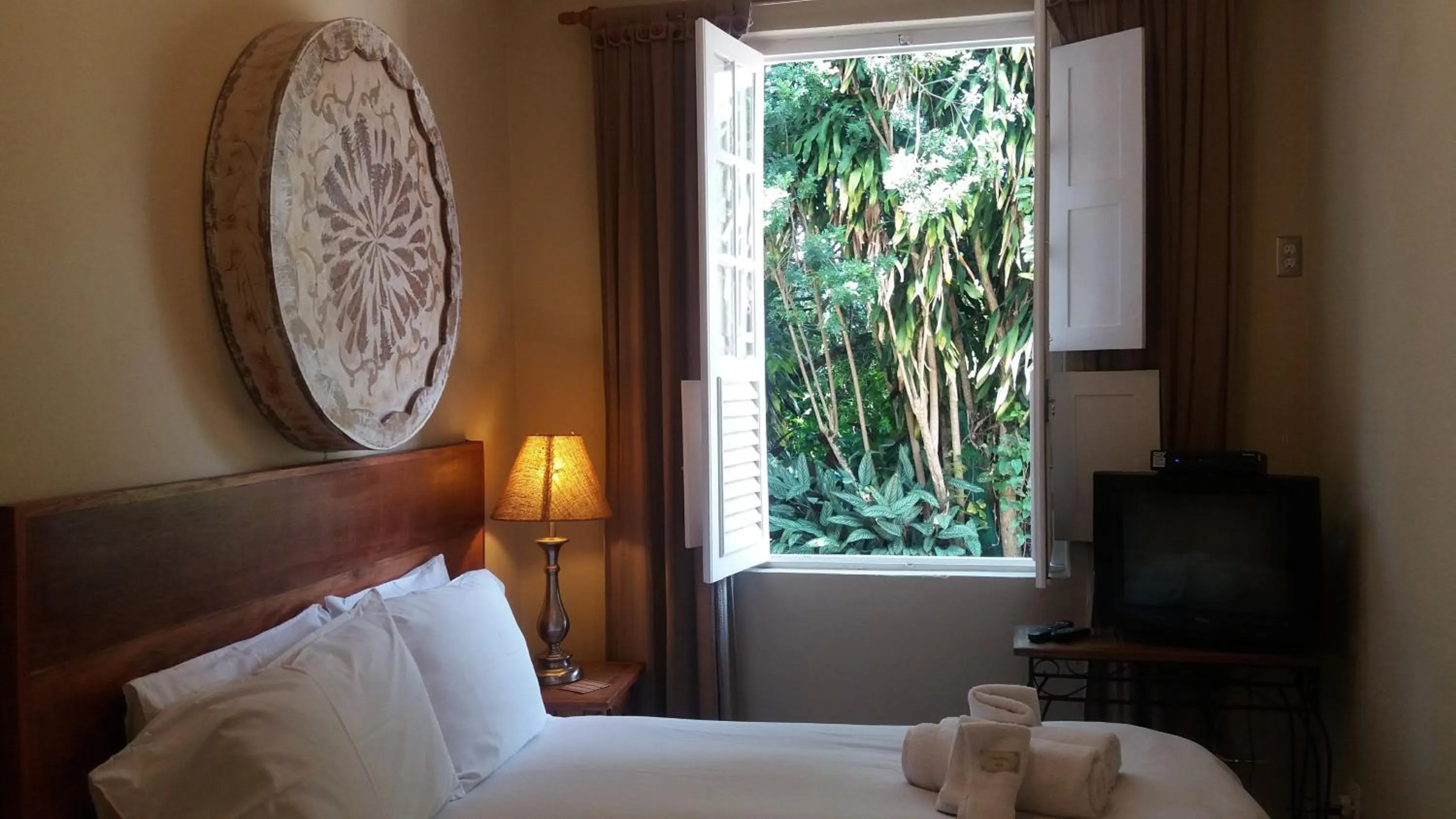 Bed in Pousada Papyrus