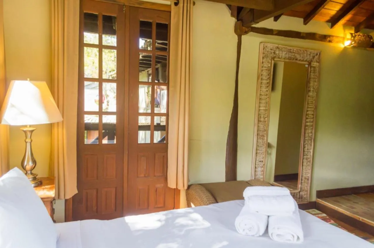 Bed in Pousada Papyrus