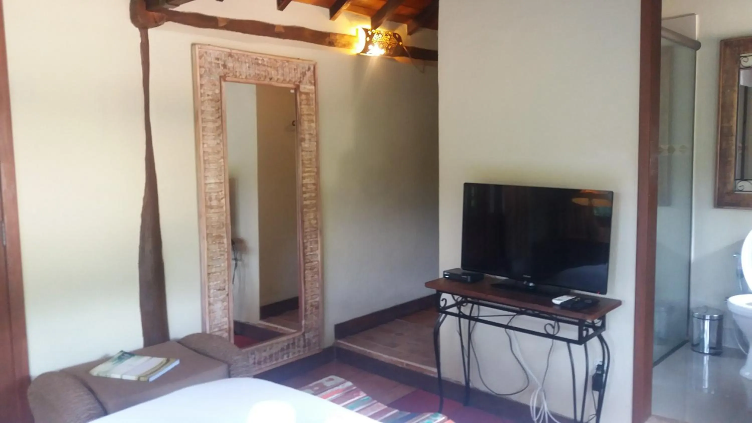 Bed in Pousada Papyrus