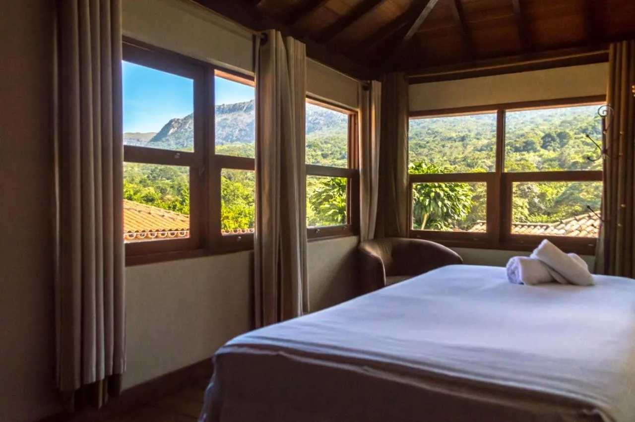 Bed in Pousada Papyrus