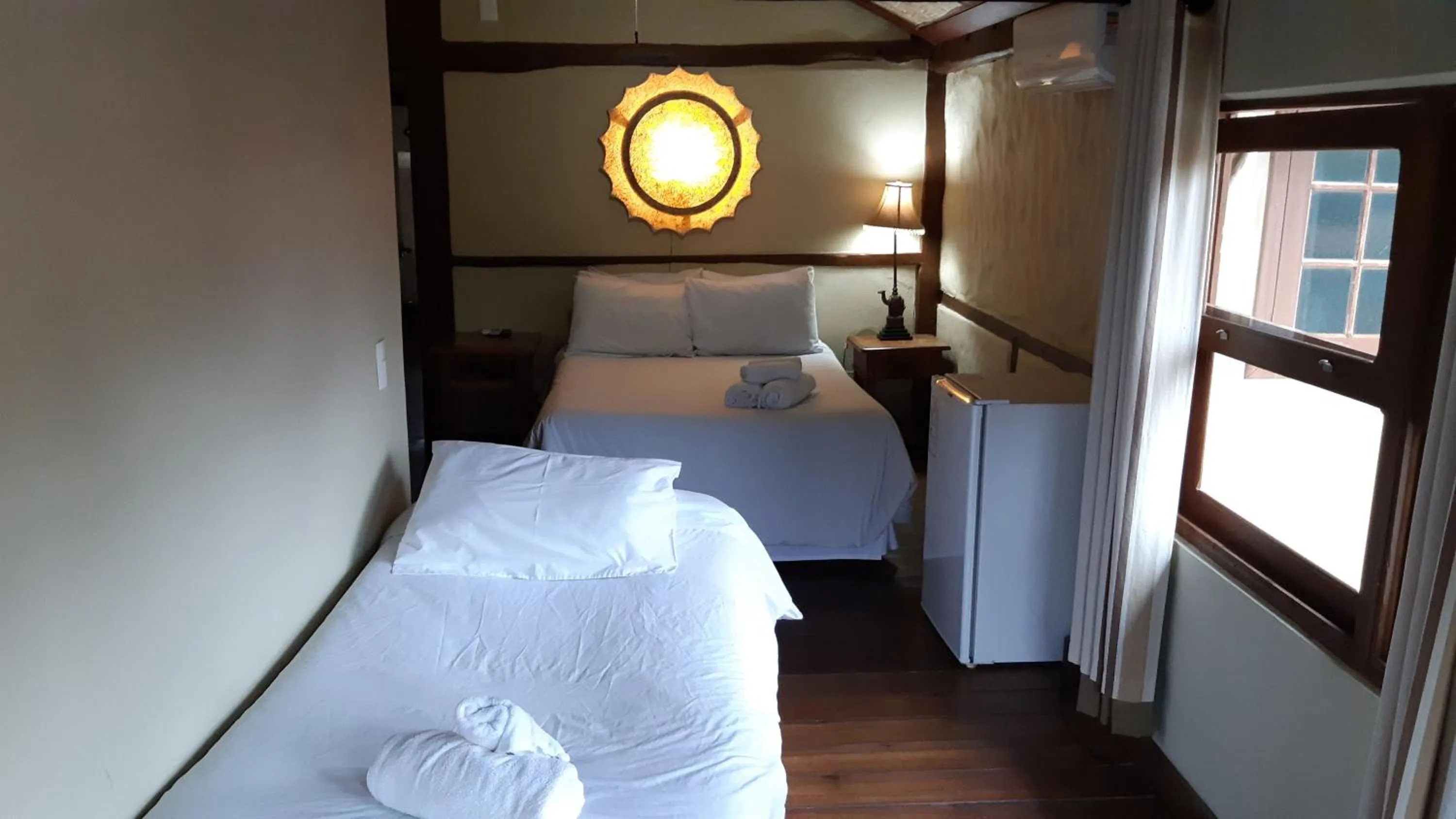 Bed in Pousada Papyrus