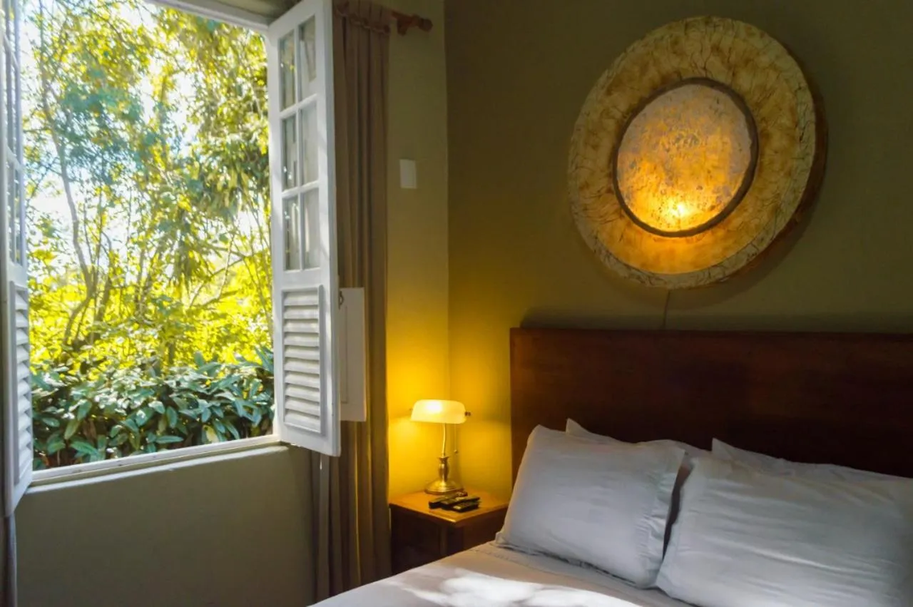 Bed in Pousada Papyrus