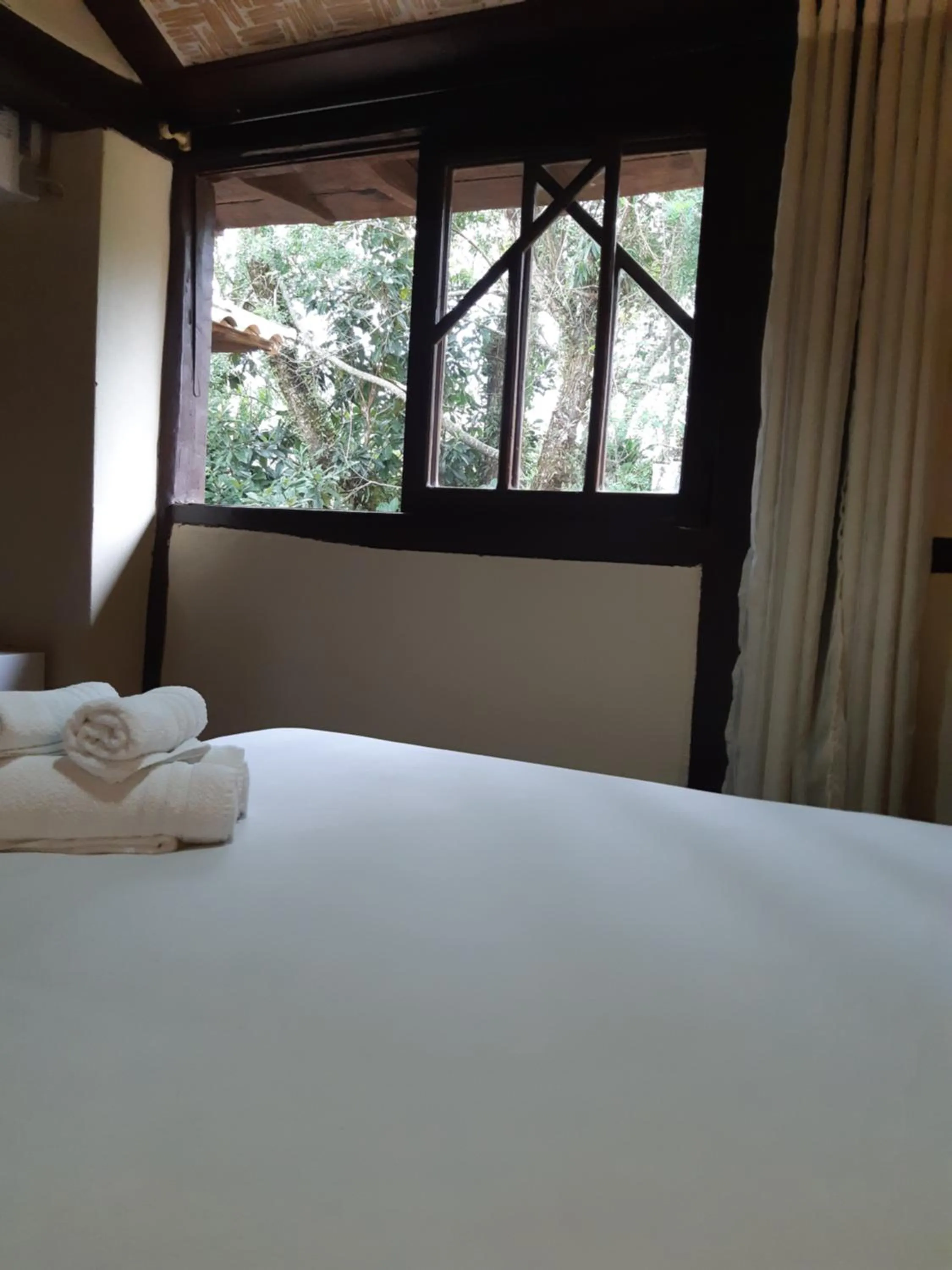 Bed in Pousada Papyrus