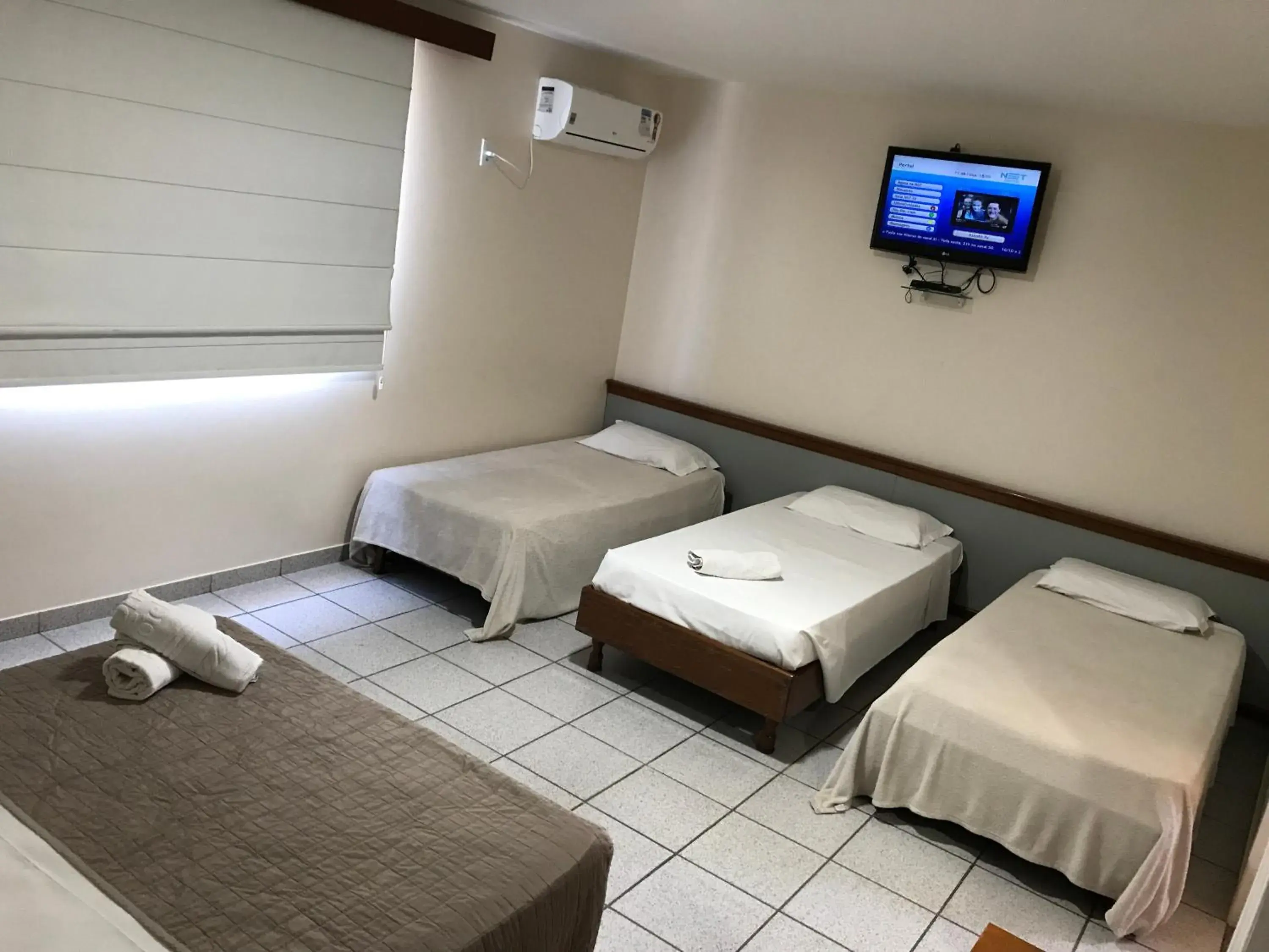 Standard Quadruple Room in Champagnat Praia Hotel Standard Quadruple Room in Champagnat Praia Hotel