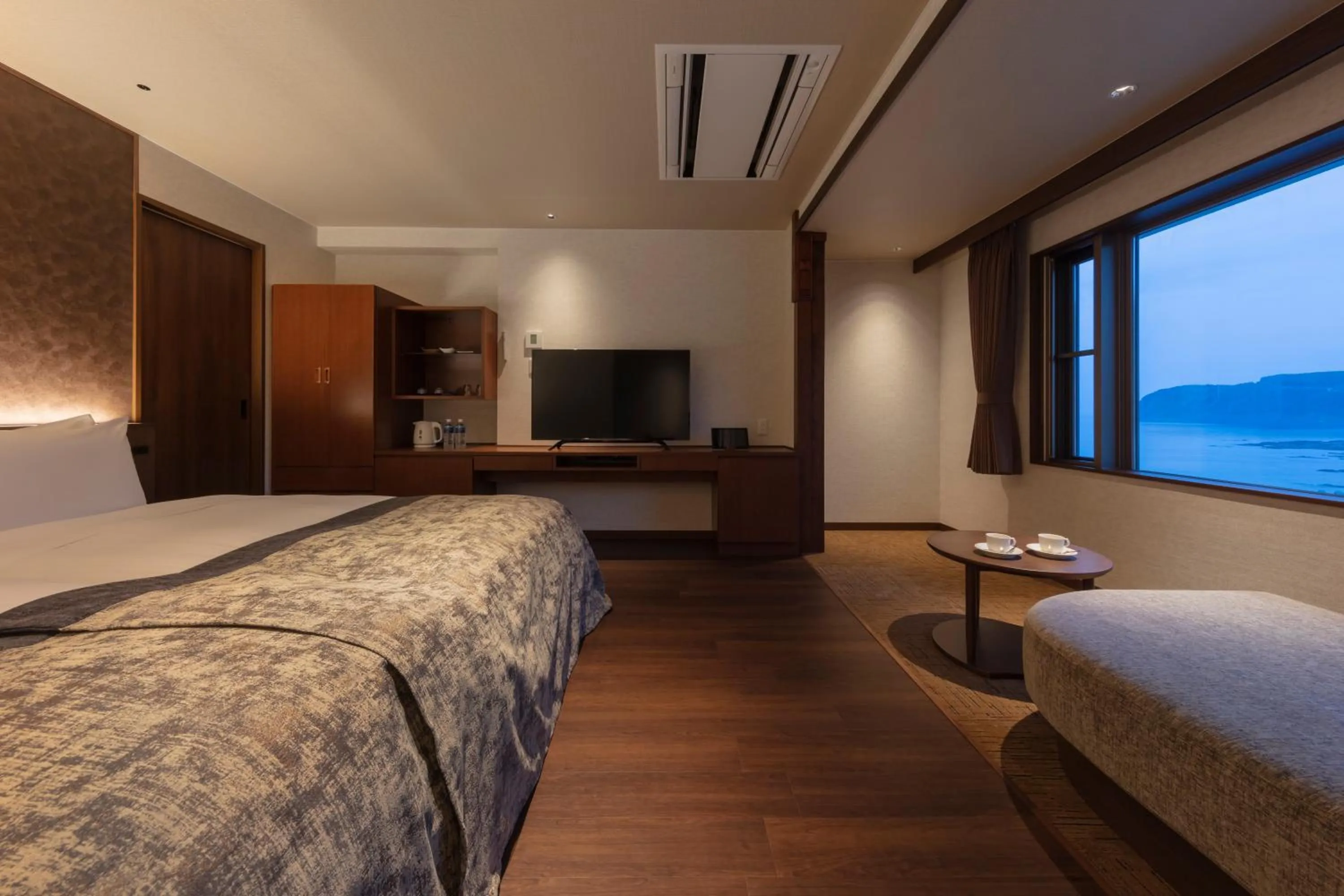 Living room, Bed in Kitakobushi Shiretoko Hotel & Resort