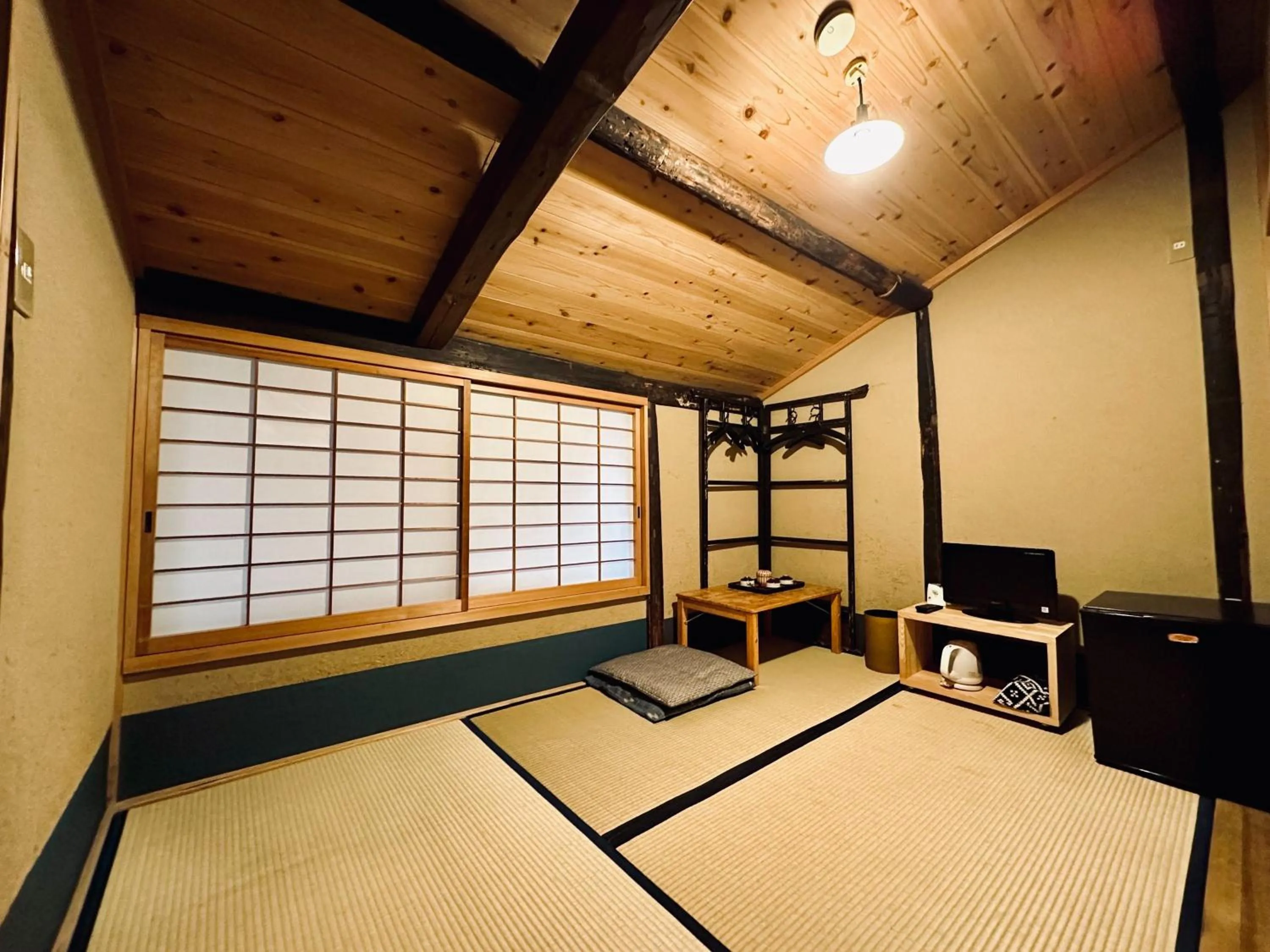 Bed in Nagomi-Ryokan Yuu