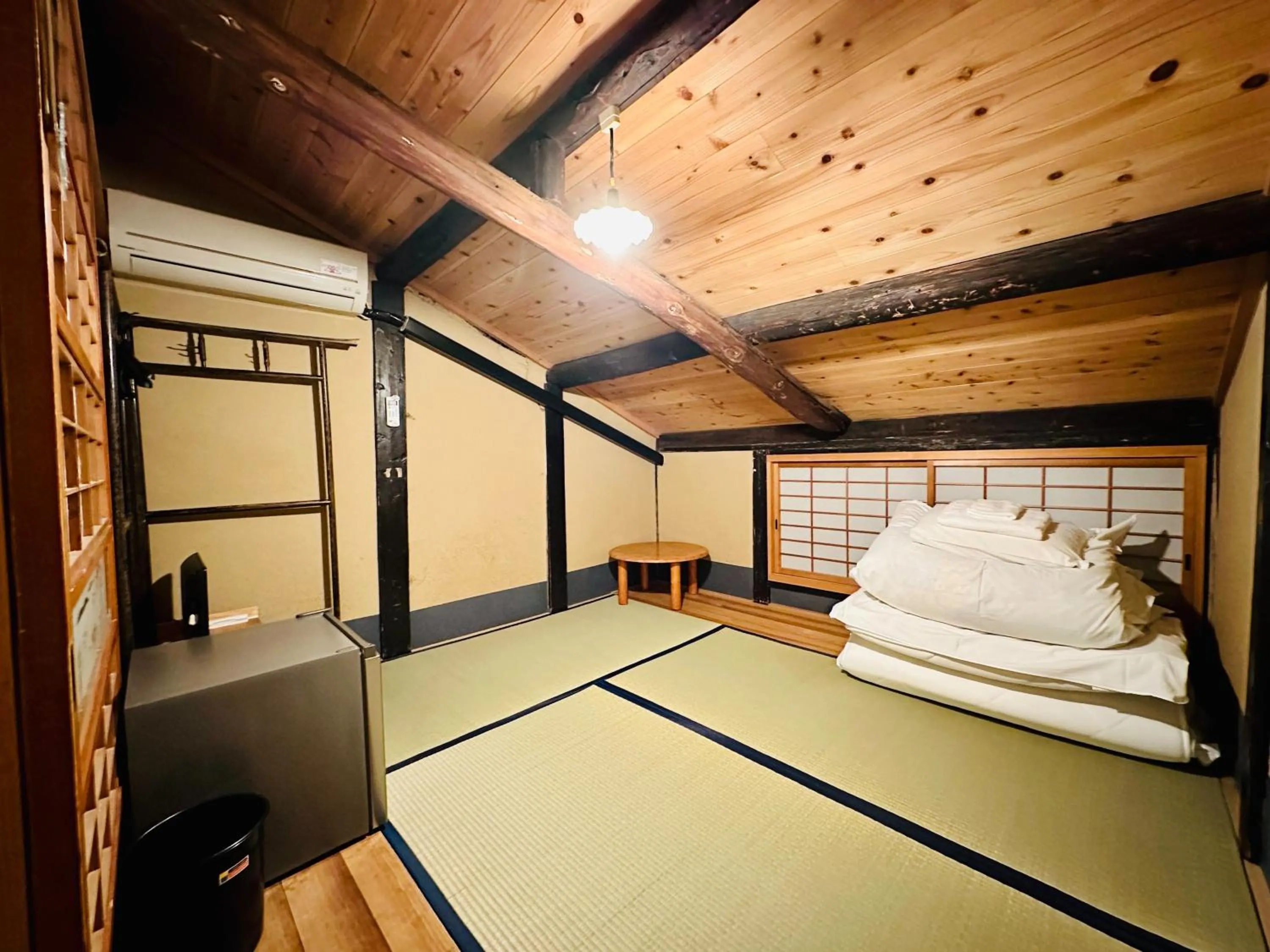 Bed in Nagomi-Ryokan Yuu