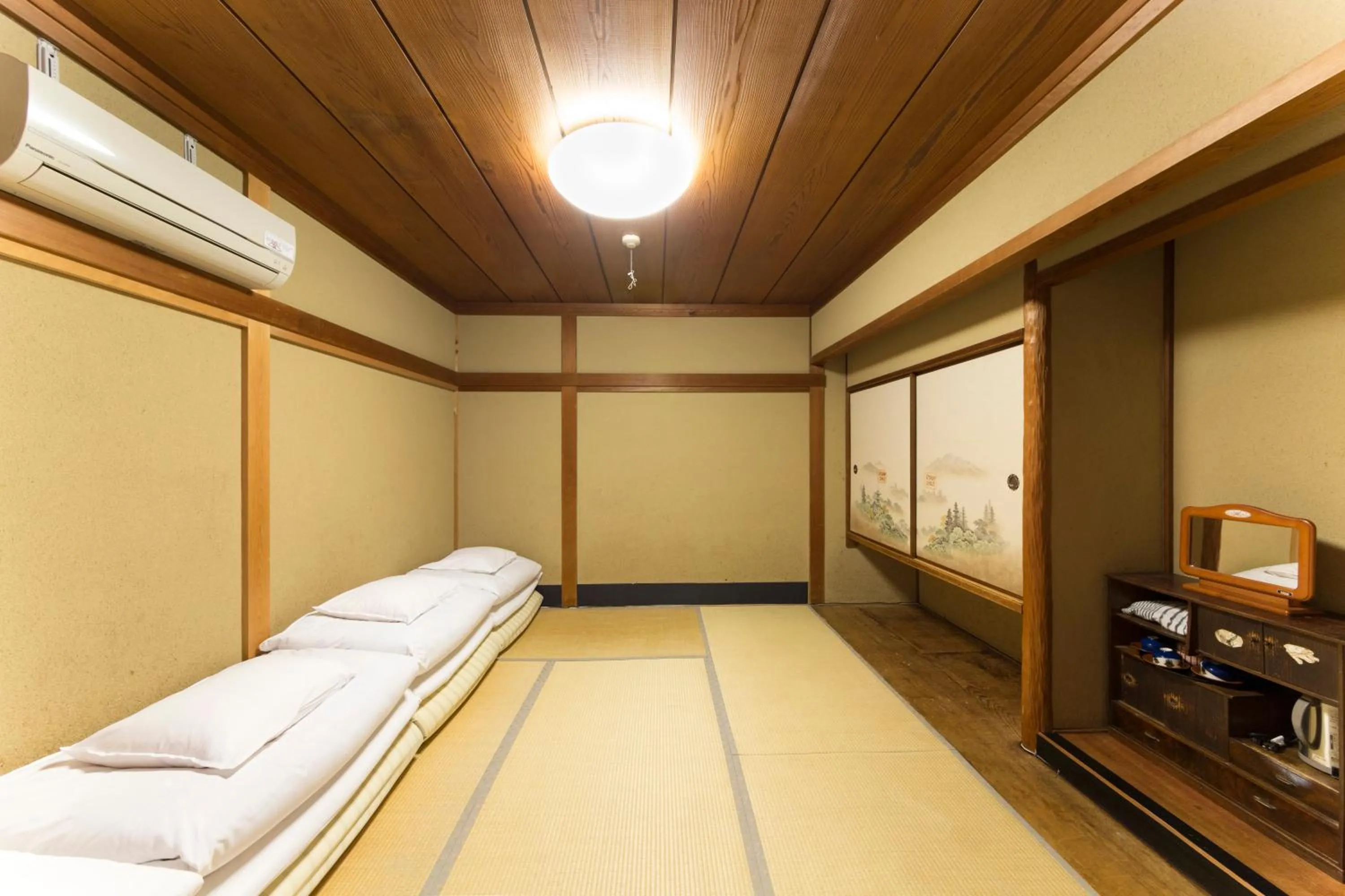 Bed in Nagomi-Ryokan Yuu