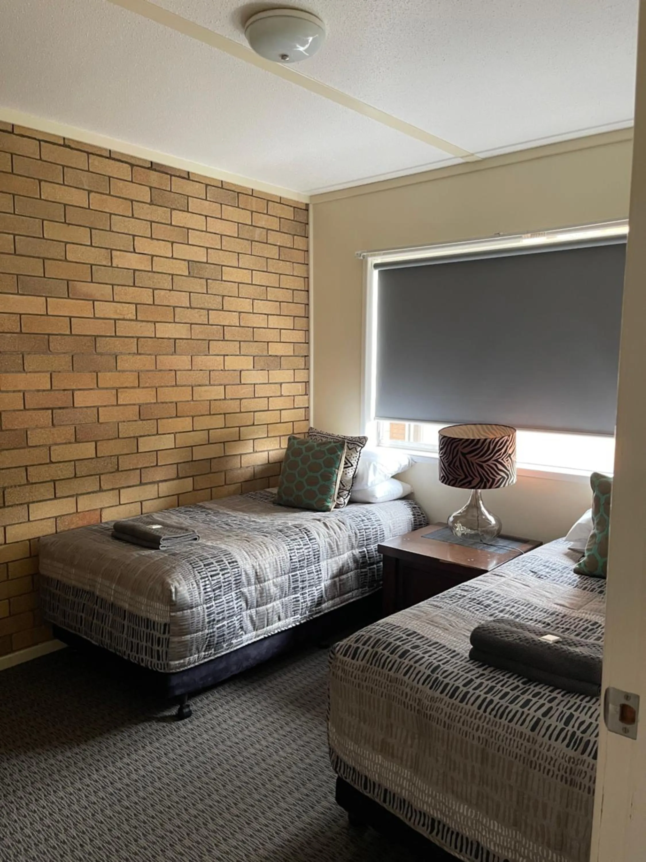 Bed in Westwood Motor Inn