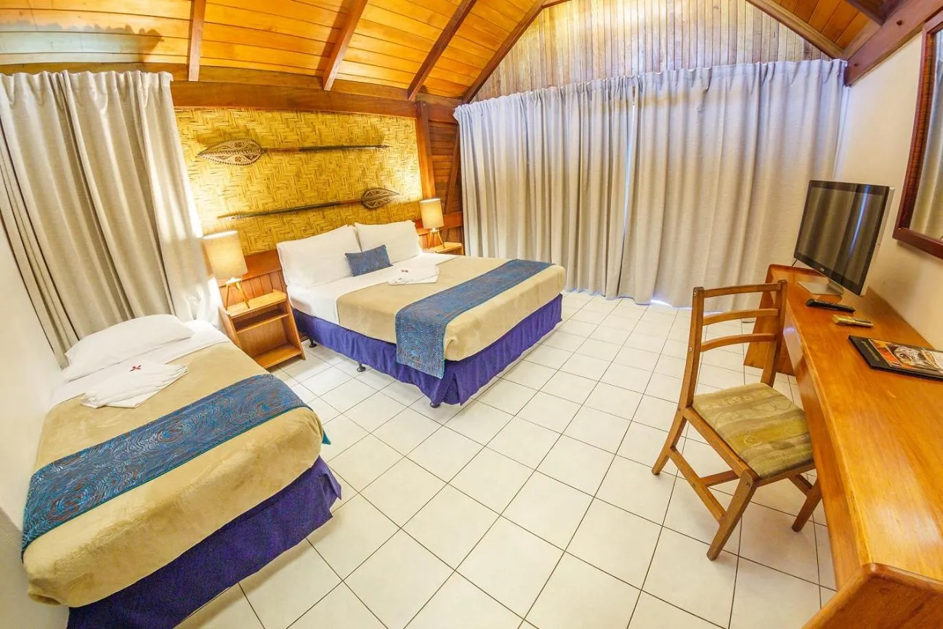 Photo of the whole room, Bed in Kokopo Beach Bungalow Resort