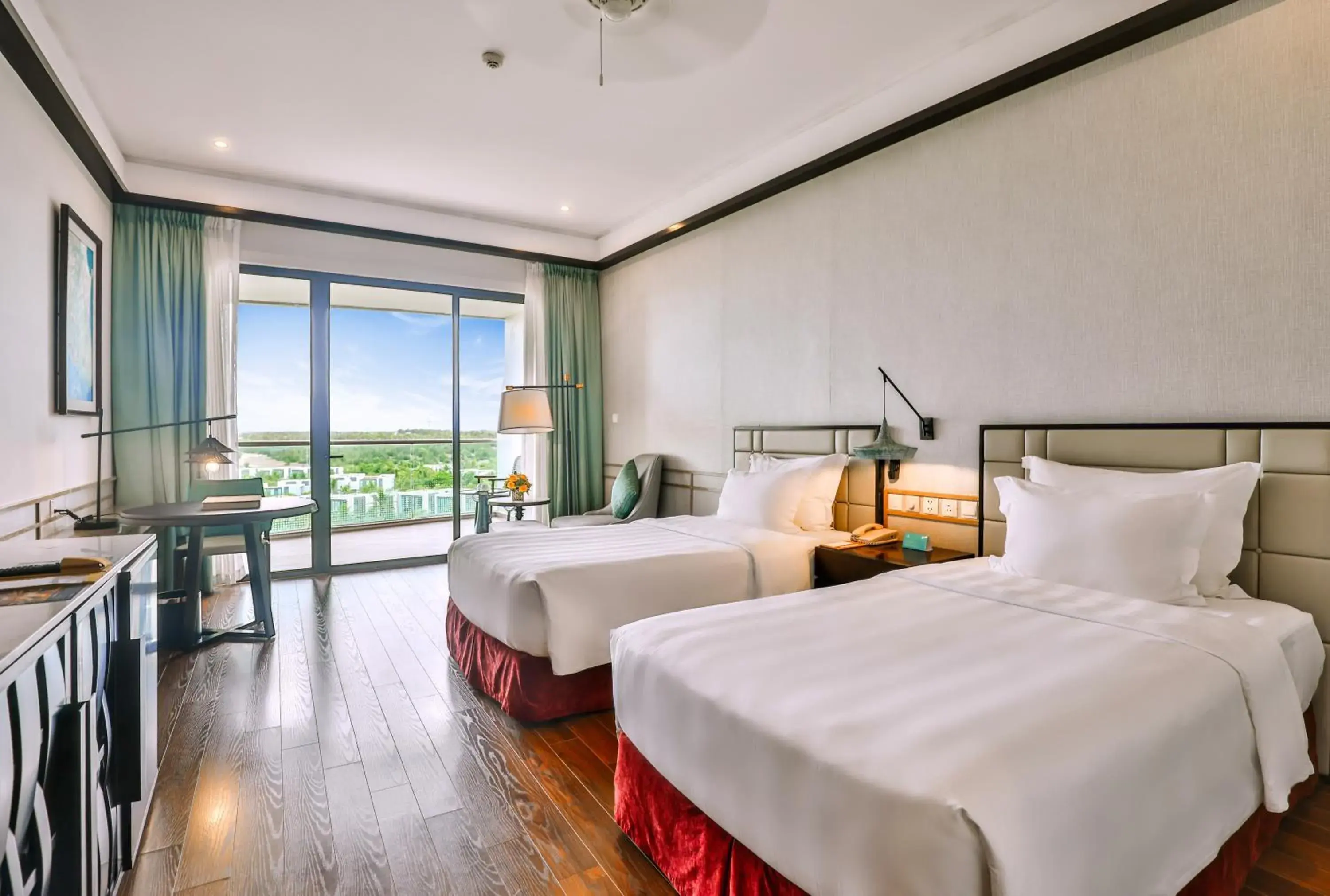 Deluxe Twin Room with Balcony and Garden View in Vinpearl Resort & Golf Nam Hoi An Deluxe Twin Room with Balcony and Garden View in Vinpearl Resort & Golf Nam Hoi An