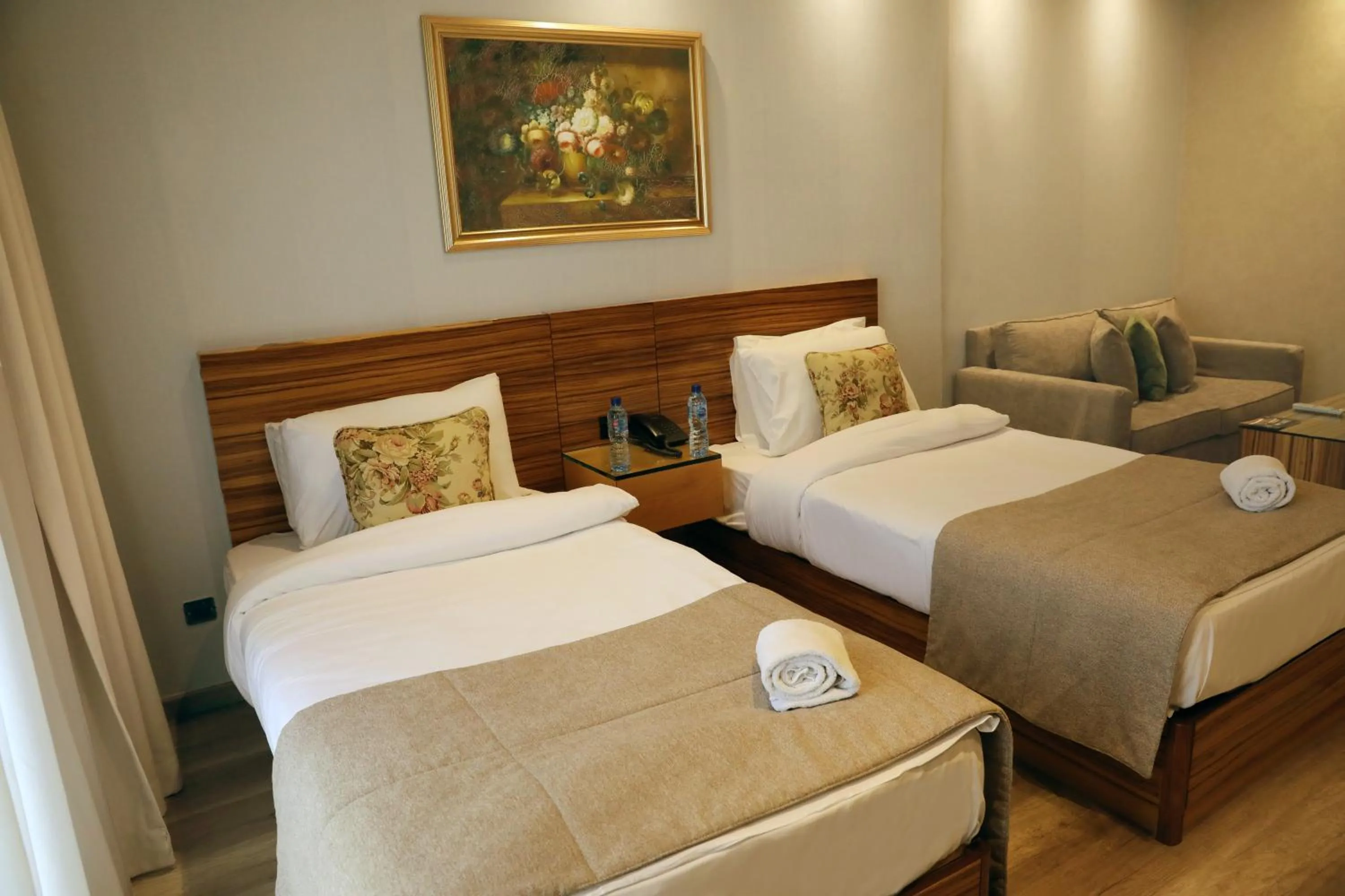 Bed in Imperial Suites Hotel