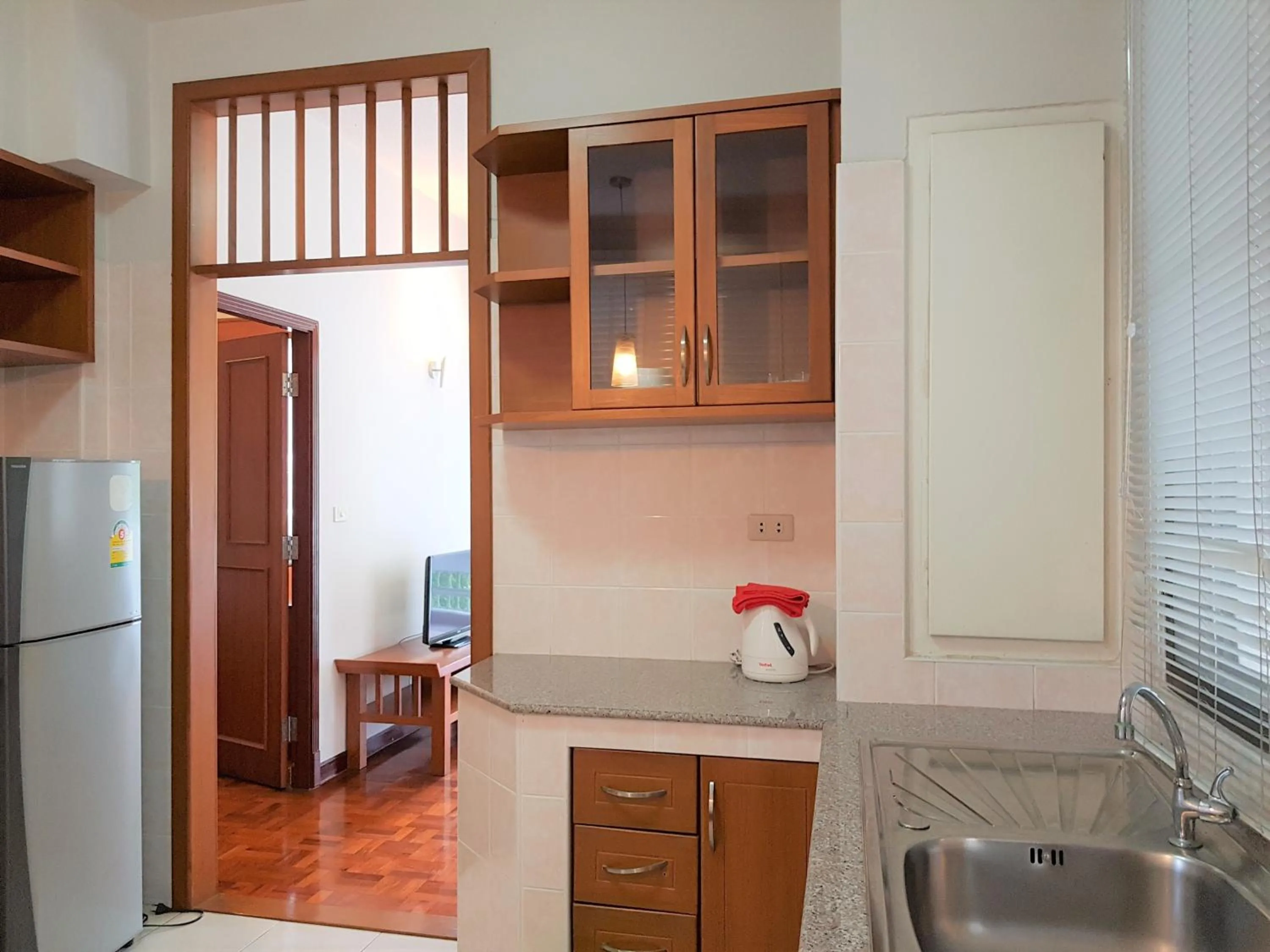 Kitchen or kitchenette in P.T. Court