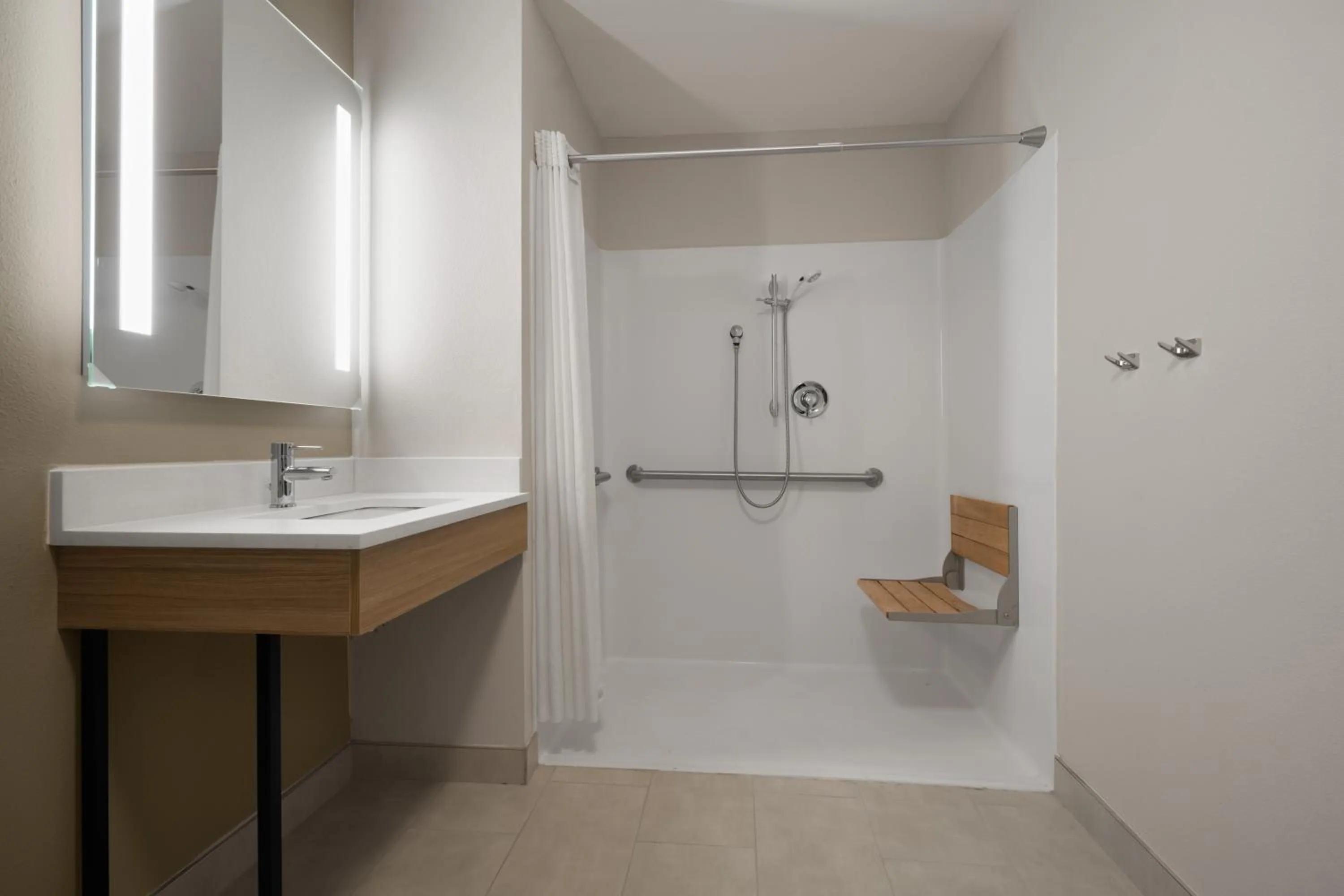 Bathroom in La Quinta Inn & Suites by Wyndham Greenville Woodruff Rd