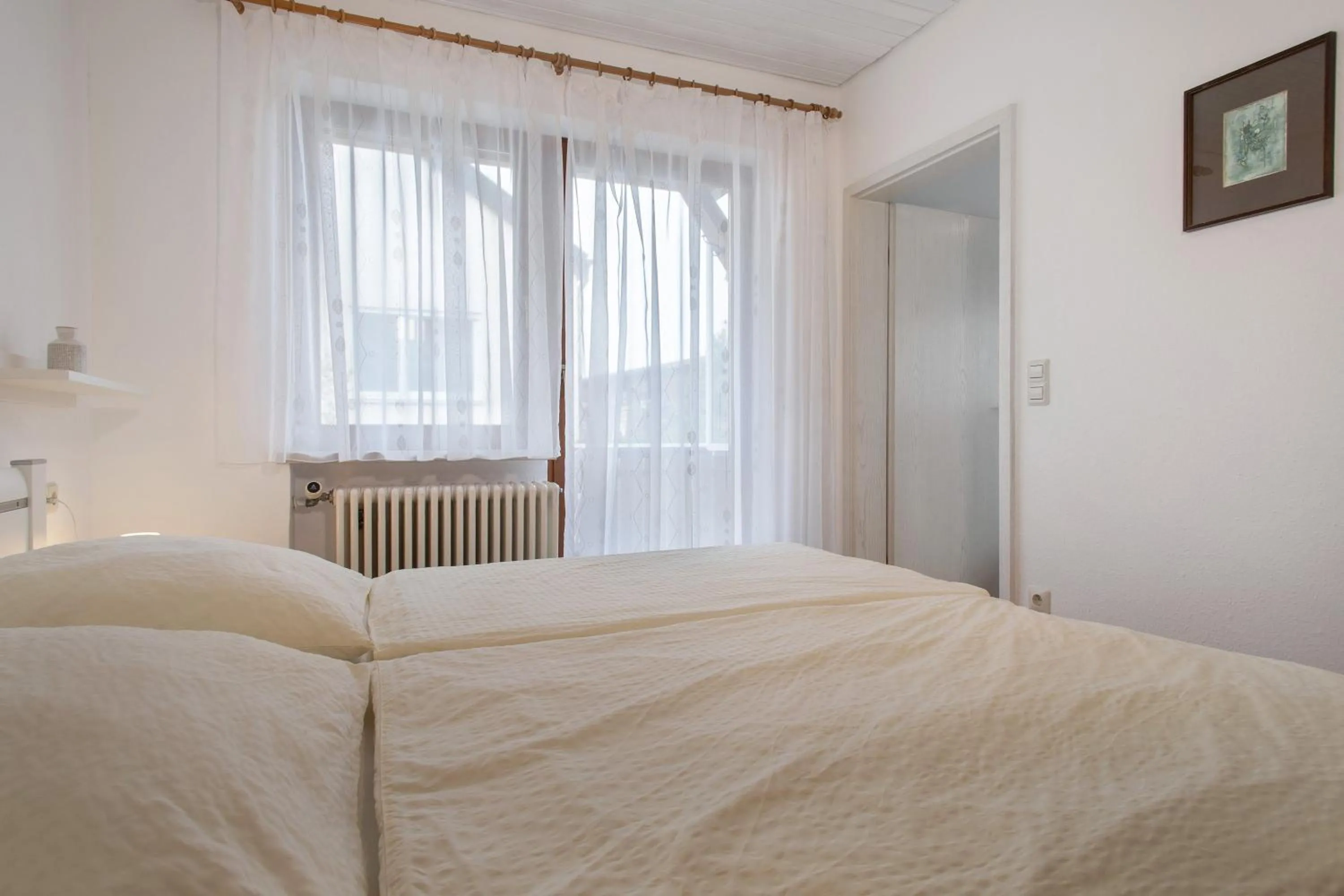 Living room, Bed in Hotel Garni Vitamari