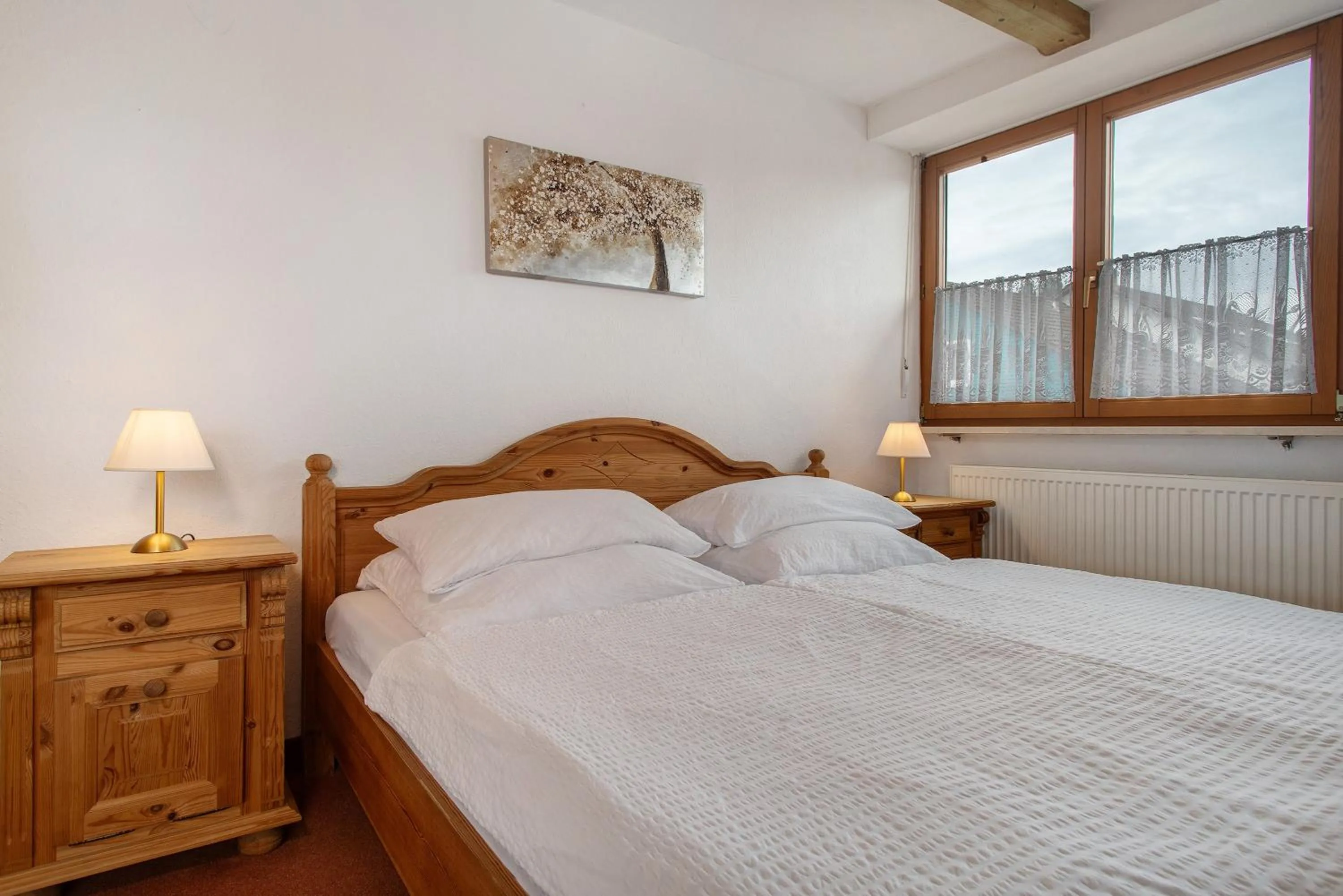 Living room, Bed in Hotel Garni Vitamari