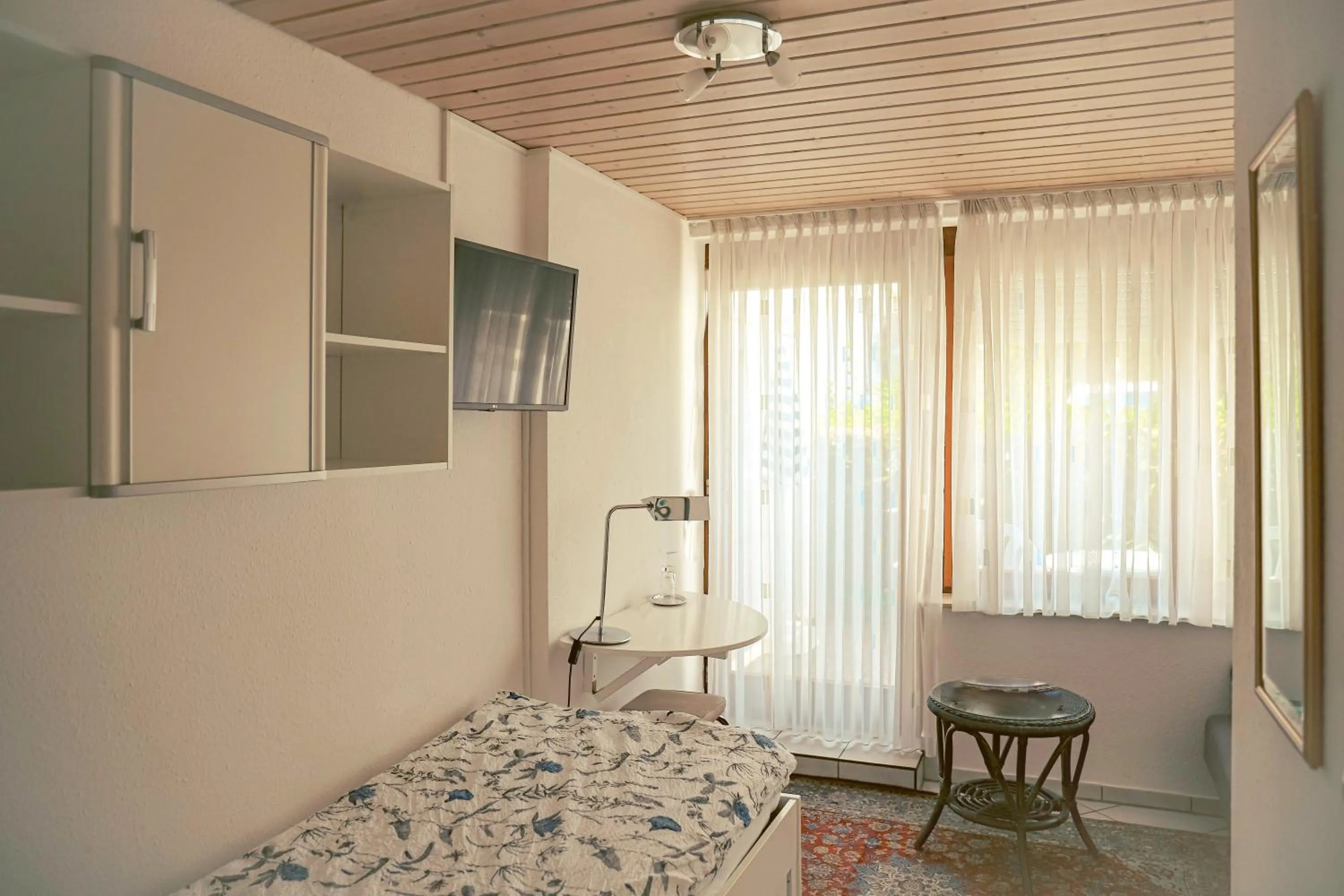 Property building, Bed in Hotel Garni Vitamari