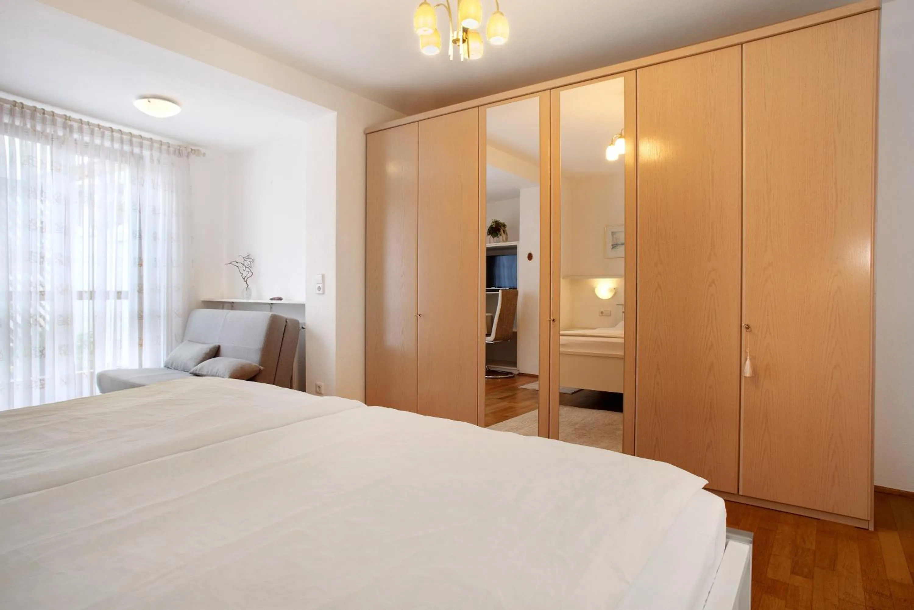 Living room, Bed in Hotel Garni Vitamari