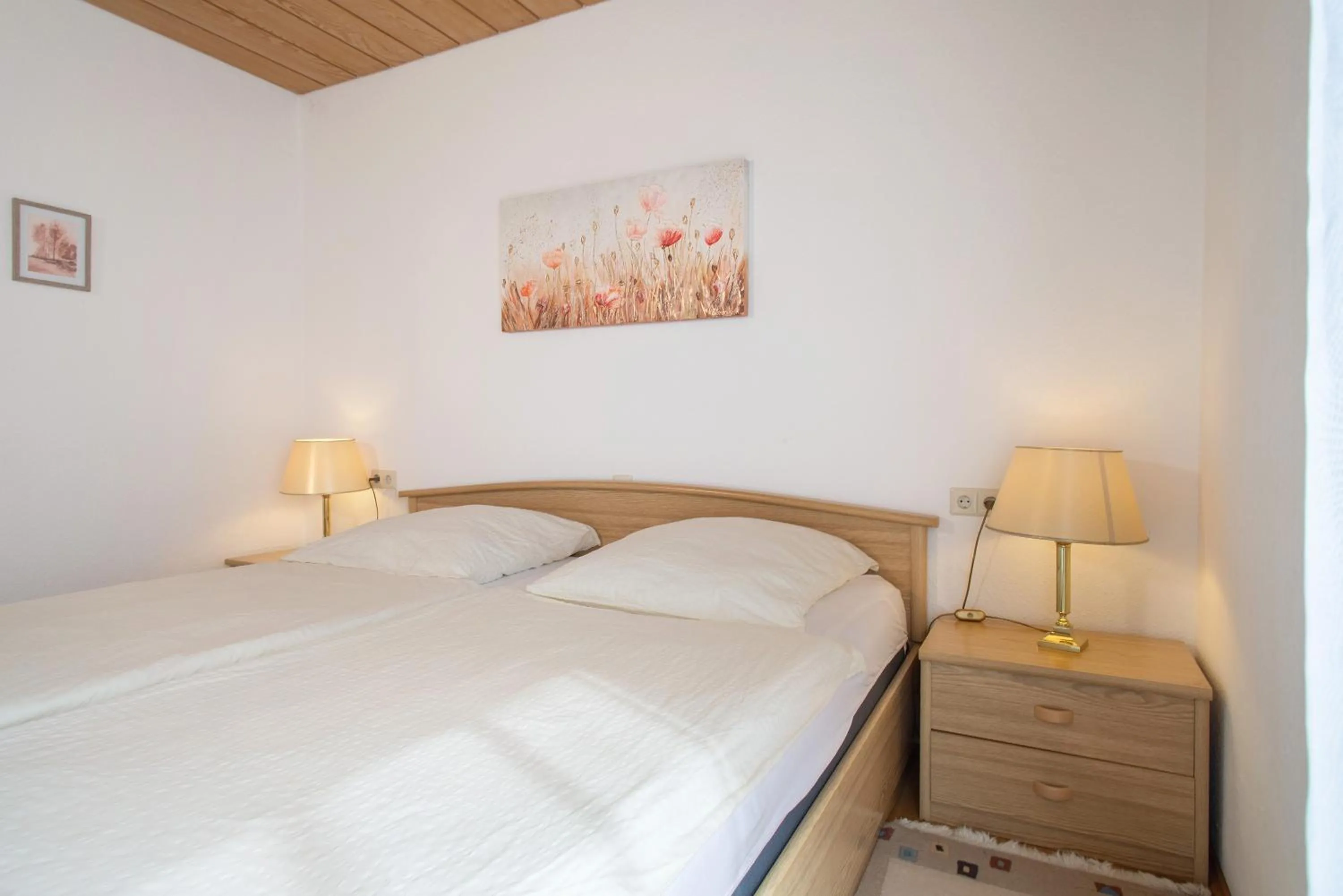 Living room, Bed in Hotel Garni Vitamari