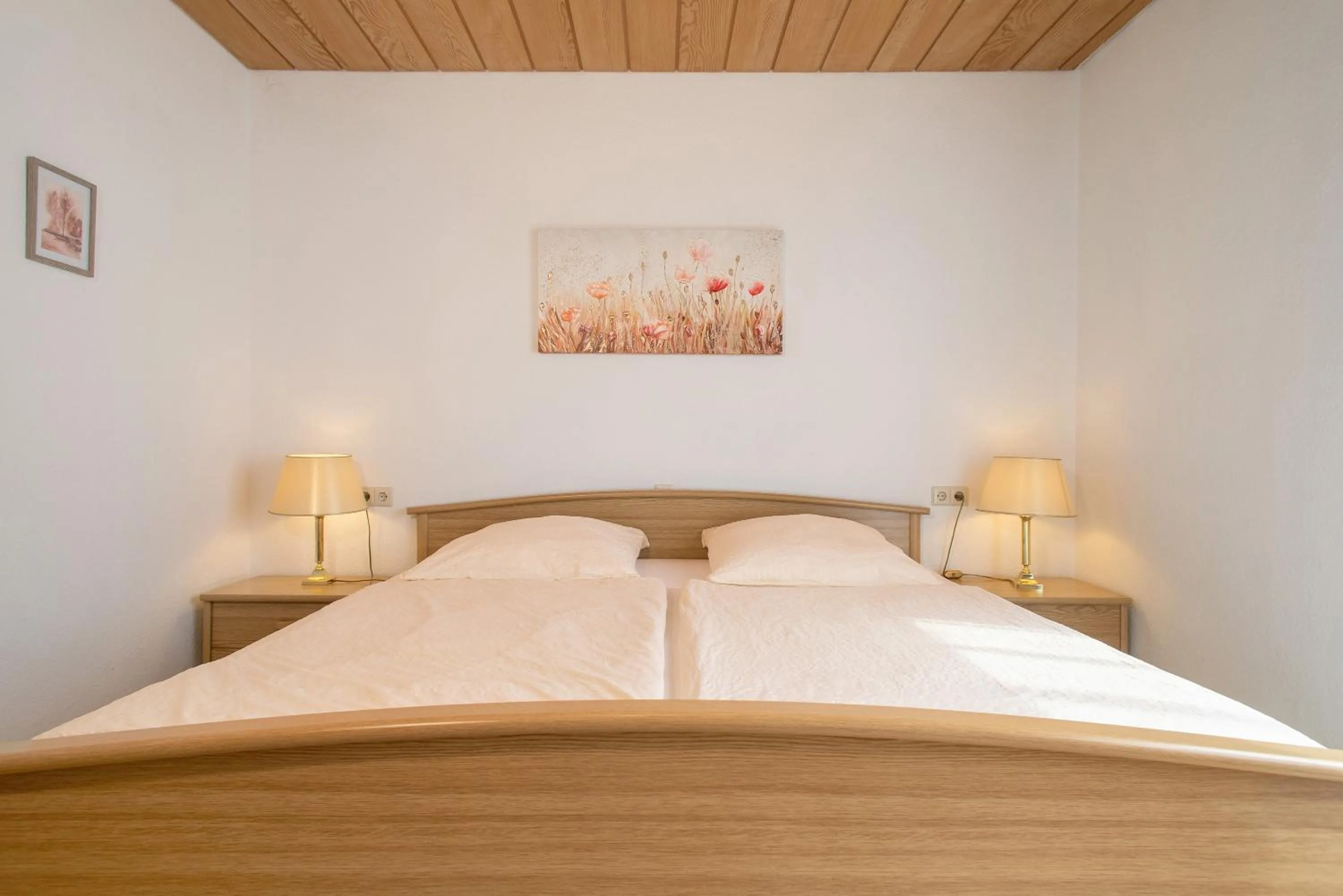 Living room, Bed in Hotel Garni Vitamari