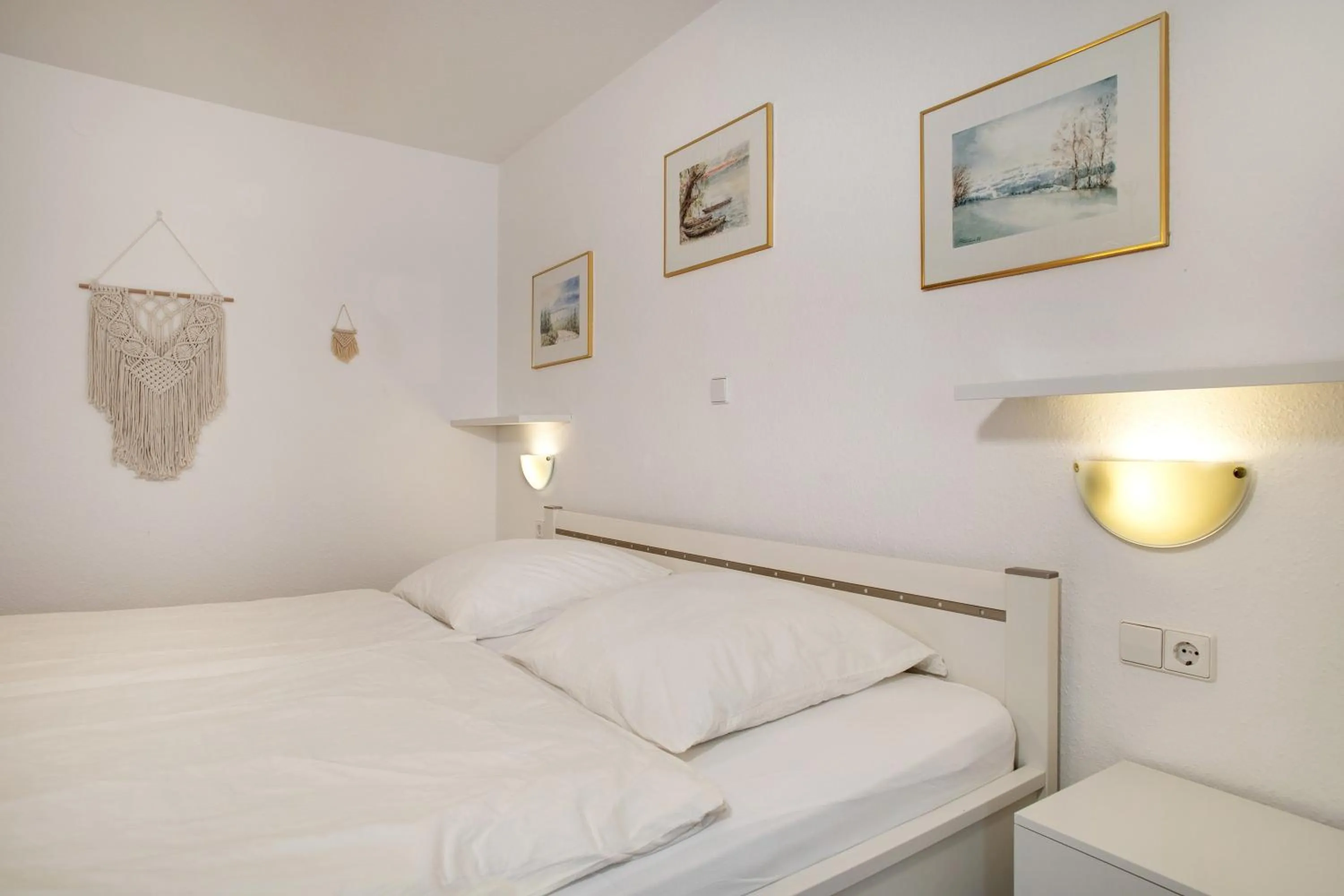Living room, Bed in Hotel Garni Vitamari