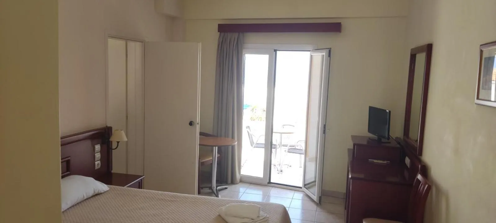 Bed in Venardos Hotel