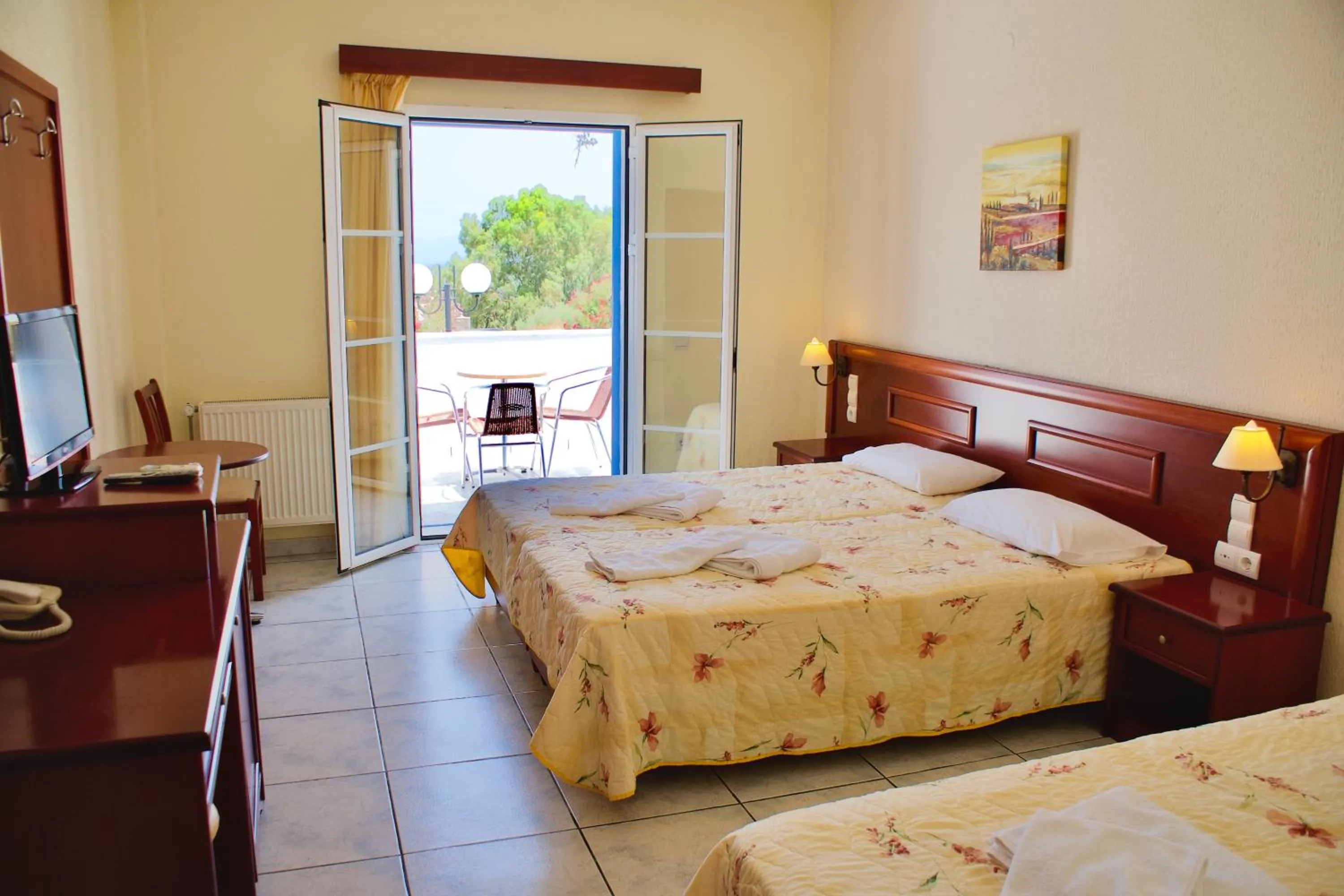 Bed in Venardos Hotel