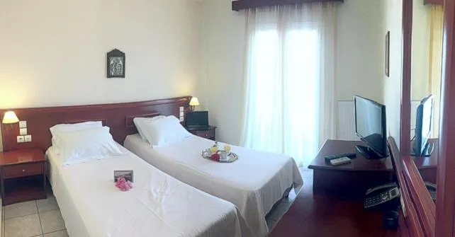 Bed in Venardos Hotel