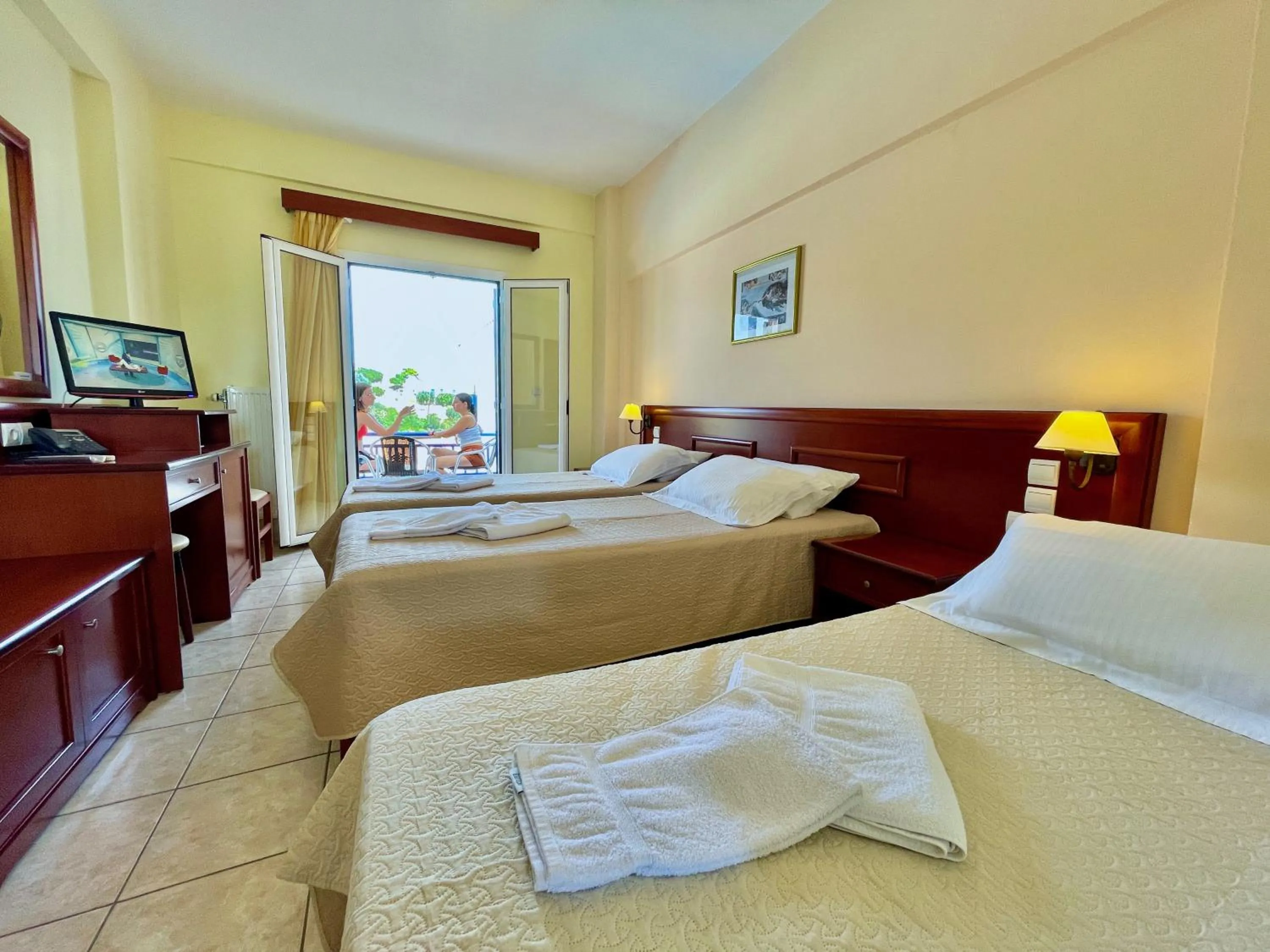 Bed in Venardos Hotel